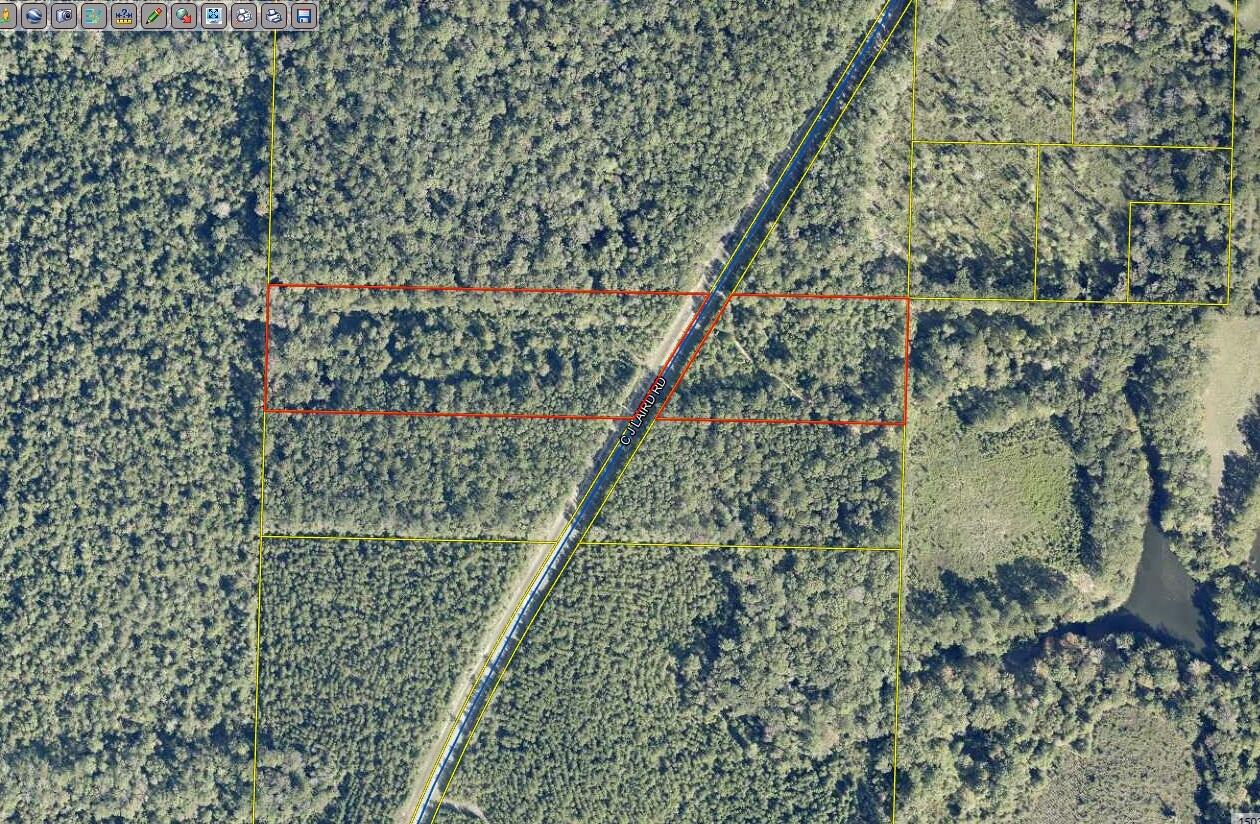 Discover 7.5 acres of private, wooded land ideally situated between DeFuniak Springs and Ponce De Leon, offering the perfect balance of seclusion and accessibility. Located on C.J. Laird Road, this parcel features natural timberland with ample space for a homesite, recreational retreat, or long-term investment. Enjoy the quiet, rural setting while still being within a short drive to DeFuniak Springs, I-10, and the growing Northwest Florida corridor. With no improvements currently in place, this property presents a blank canvas for your vision. This is an excellent opportunity to secure acreage in an increasingly sought-after area of Walton County.