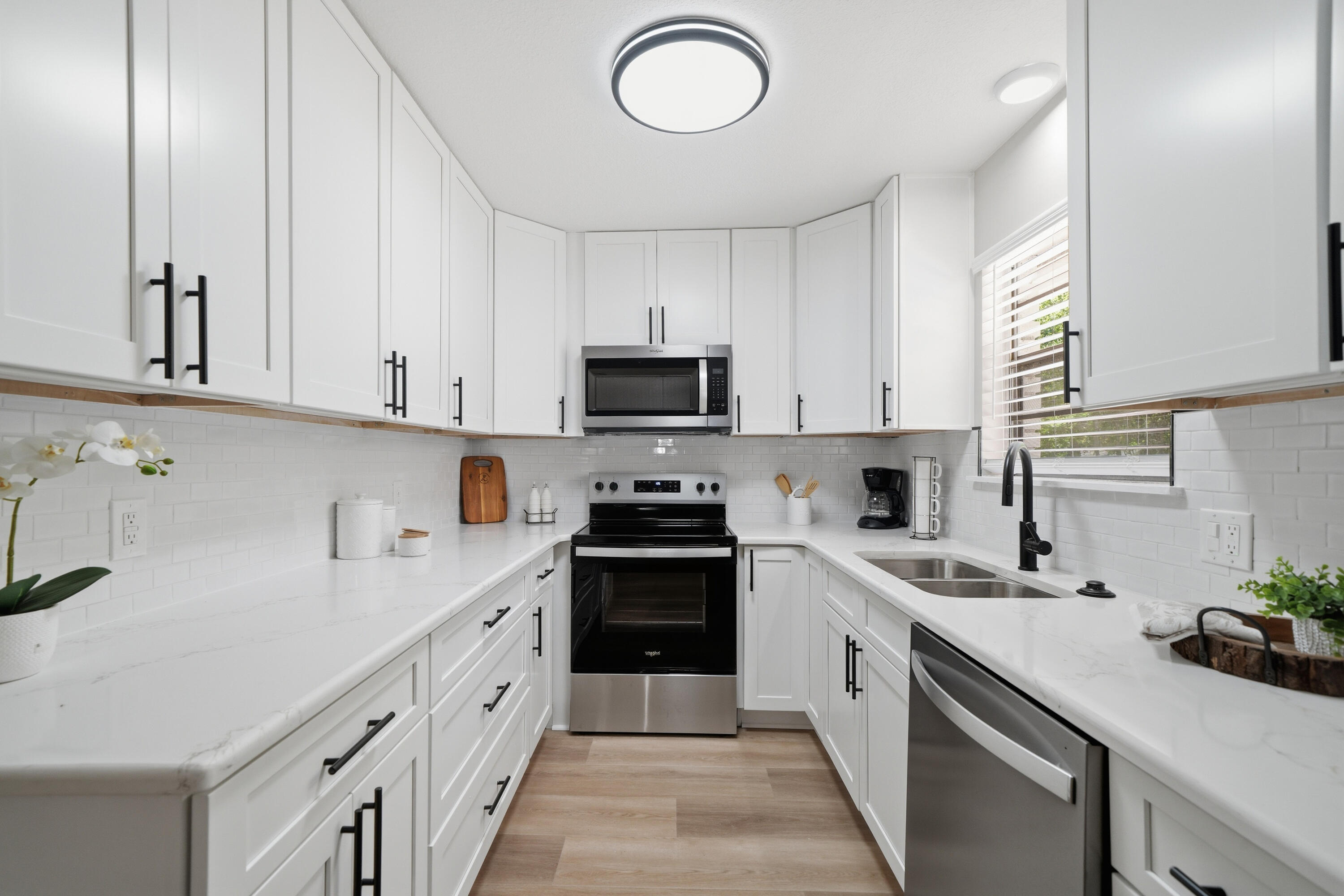 2026 AC & Water Heater; 2013 Roof, 2014  Septic, pumped out located in backyard, on left side of back of home.100% Updated 4BR/2.5BA on nearly ½ acre with a 2-car detached garage. New AC, full rewire, brand-new kitchen with granite and stainless steel appliance package, updated baths, all new flooring, tile floors in bathrooms, new fans and lighting, fresh interior and exterior paint, new textured ceilings, and a huge family room. Extremely neat, fully renovated, and truly move-in ready. Priced to sell.
Includes full-size 2-car detached garage.