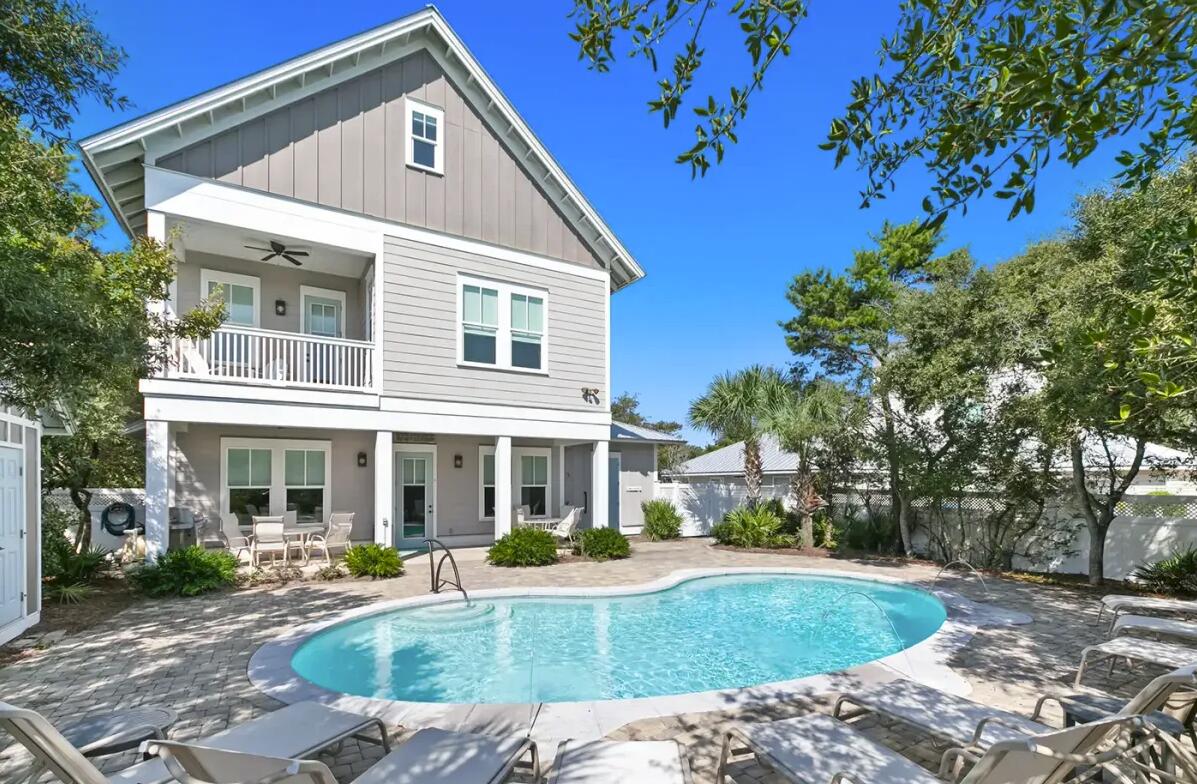 Presenting an exceptional opportunity to own a luxury coastal asset situated between Aly's Beach and WaterSound Beach, one of the most sought-after locations--walking distance (~500 ft.) to deeded beach access with no HOA, a rare & valuable combination for both private ownership and high-performing rentals.
This 5-bedroom, 5-full Bath, & 2- Half bath residence is thoughtfully designed to maximize guest capacity, lifestyle flexibility and offering gulf views. The main level kitchen must haves include 2 ovens, 2 refrigerators and 2 dishwashers.  The third-floor entertainment level serves as a standout feature, offering a custom bunk room, full bath plus half bath, & an expansive lounge that seamlessly functions as a game area & wet bar featuring a beverage fridge & wine cooler--ideal for hosting multigenerational use & enhancing rental appeal.  Multiple bedroom suites provide privacy and comfort, supporting strong nightly rental demand, while open living spaces create a resort-style experience guests seek along 30A. 
Immediately enjoy the open concept feel as you enter this home with the spacious kitchen adjoining to the living and dining area. 
Notable features include Bamboo flooring, a gas fireplace, heated pool with colored fountain/light options, 1-car garage, private elevator, and outdoor shower area. The garage also offers a secondary washer & dryer for pool/beach items. 
Solar panels add long-term value through reduced operating costs, further strengthening the property's investment profile. 
Located minutes from 30A's premier dining, shopping, and beach experiences, this home delivers a compelling blend of luxury living, income potential, and appreciation-driven ownership. Just a 3-minute walk or 1-minute bike ride to neighborhood deeded beach access, you won't find a more desirable property. Whether positioned as a private coastal retreat or a premium short-term rental, this home stands as a rare Inlet Beach offering with enduring value and exceptional marketability.