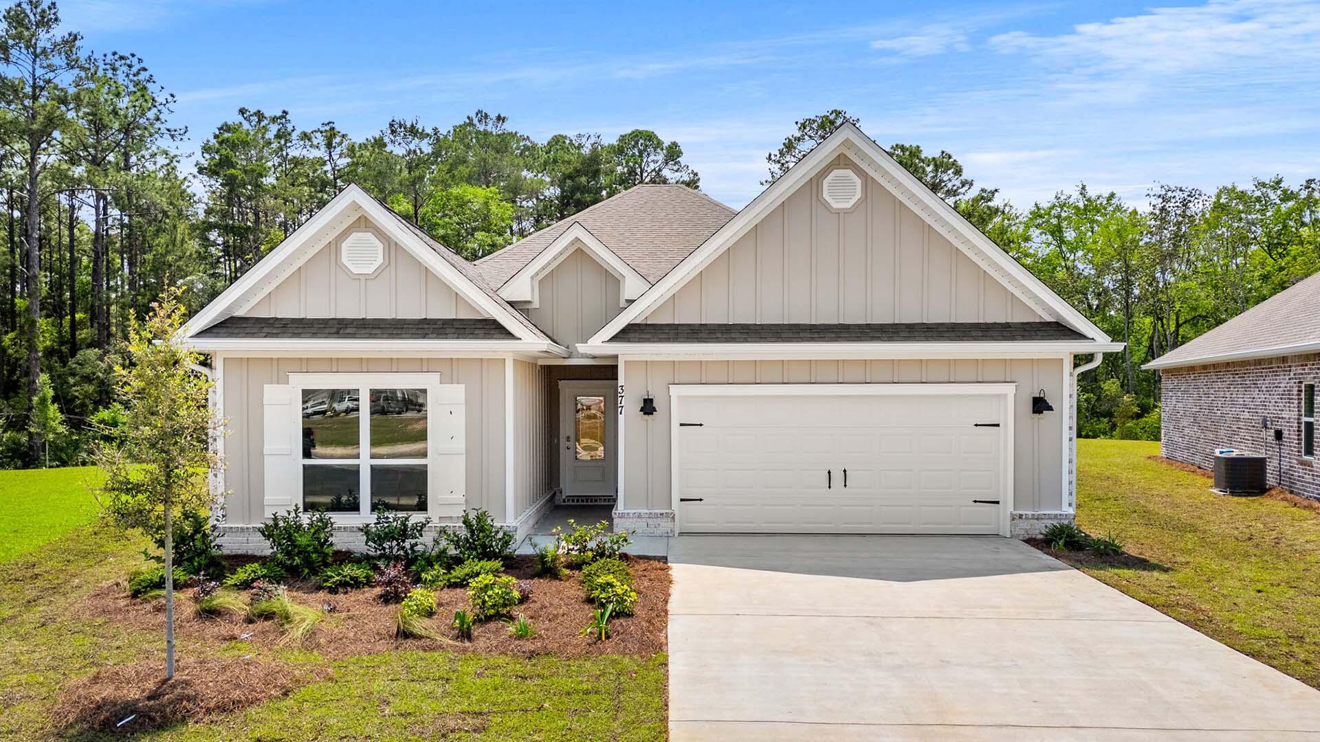 Welcome to 377 Holley Grove Lane, a new home at Holley Grove at Peach Creek, in Santa Rosa Beach Florida. This home is move in ready and features the Kennedy floor plan. Entering the home you will find a brightly lit hallway leading to two guest bedrooms which share a full bathroom. At the heart of the home, you will find an open concept living area that is brightly illuminated by the many windows and glass back door.  An exceptional feature of this home includes EVP flooring throughout, which allows for a seamless transition between rooms. The kitchen and bathrooms have beautiful quartz countertops and cabinetry that allows for all of your storage needs. Enjoy time with family and guests in your formal dining room and the open kitchen with center island which allows for entertaining.  An exceptional feature of this home includes EVP flooring throughout, which allows for a seamless transition between rooms. The kitchen and bathrooms have beautiful quartz countertops and cabinetry that allows for all of your storage needs. Enjoy time with family and guests in your formal dining room and the open kitchen with center island which allows for entertaining. There is a covered back patio that is accessible from the living room. Stainless steel appliances are included with a smooth top stove, microwave and dishwasher.  

 

The primary bedroom is located at the back of the home and has a private ensuite bathroom that has a soaking tub, separate shower, a dual sink vanity with lower cabinetry for storage and a large closet with ventilated upper shelving. Continuing back through the living area past the dining room, you will find an additional hall leading the large laundry room and two more guest bedrooms that share a full bathroom. Home and community information, including pricing, included features, terms, availability and amenities, are subject to change at any time without notice or obligation. Images are of similar Kennedy floor may include custom design features not available in other homes.