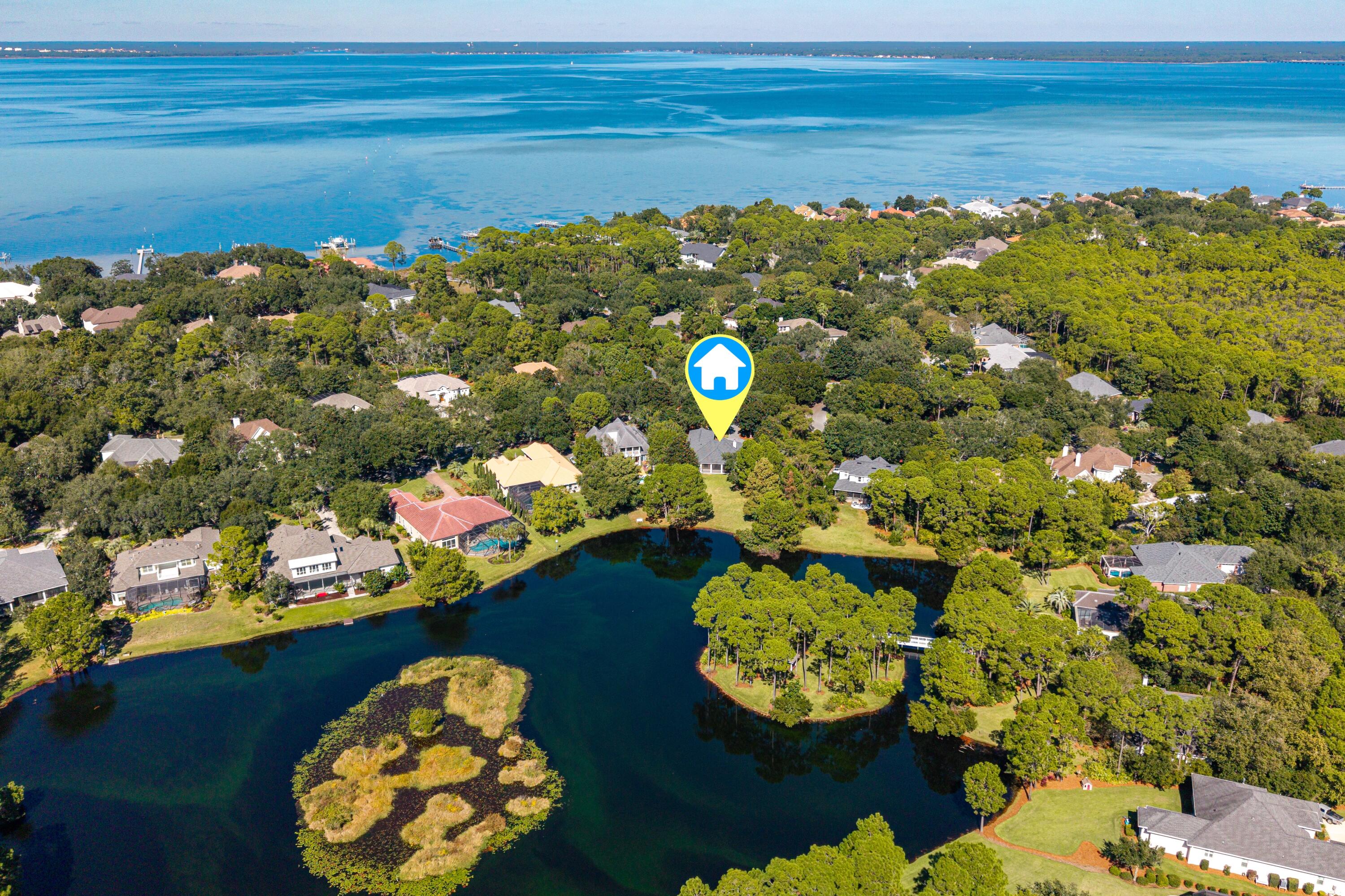 BACK ON THE MARKET - At no fault of the Seller.  Welcome to 228 Matties Way, an exquisite lakefront retreat that perfectly balances timeless elegance with modern sophistication. Completely renovated from 2023 to 2025, this stunning home showcases exceptional craftsmanship, designer finishes, and sweeping views of Lake Rangia. Every detail has been thoughtfully curated to create a residence that is both beautiful and highly functional. Step inside to an inviting open-concept interior where luxury and comfort meet -The designer kitchen has been totally transformed with custom cabinetry, premium quartz countertops, and top-of-the-line Sub-Zero, Cove, and Wolf appliances. Undermount lighting and a custom tile backsplash add both warmth and sophistication. In the living area, a new wood-burning fireplace with a custom cypress mantle and quartz-topped built-ins creates a cozy yet refined focal point, while the adjoining dining room features a brick accent wall that ties seamlessly into the home's design. The fully renovated bathrooms, including the master, Jack & Jill, and guest baths, feature high-end finishes and elegant detailing throughout. A custom ''Her's'' master closet provides a beautifully organized space with fully customized storage solutions. Throughout the home, you'll find new flooring, recessed lighting, designer fixtures, custom interior shutters, and solid two-panel doors with premium hardware. Every doorway, window, and baseboard has been finished with elegant, stacked header trim, and the entire interior - including ceilings, walls, and trim - has been freshly painted. A new Trane 5-ton HVAC system ensures year-round comfort and energy efficiency. The exterior has been equally transformed with every element upgraded for beauty, durability, and peace of mind -
All windows and doors have been replaced with hurricane-impact-rated models, complemented by hurricane-rated garage doors and a new roof installed in August 2021.
The screened back porch, finished with a pine tongue-and-groove ceiling and stone tile flooring, offers the perfect place to relax while enjoying tranquil lake views.
A new paver driveway, upgraded exterior lighting, and a rebuilt irrigation system complete the thoughtful exterior enhancements.
Set on one of the most desirable lots in Kelly Plantation, this property offers breathtaking views of Lake Rangia, a deep manicured backyard, and the serene beauty of the bird sanctuary beyond your porch. Best of all, it sits in Flood Zone X, so no flood insurance is required.
Located within the exclusive gated community of Kelly Plantation, residents enjoy world-class amenities including a meticulously maintained championship golf course, golf clubhouse with bar and grill, ballroom, and restaurant.
A separate Owner's Club offers spaces for meetings and events with both large and small rooms, full kitchen facilities, and a state-of-the-art fitness center. Outdoor recreation abounds with tennis, pickleball, and basketball courts, scenic nature trails, a dog park, and an equestrian center. Just a short golf cart ride away are Destin's iconic sugar-white beaches, along with the area's finest dining, boutique shopping, championship golf, and world-class fishing.

With every major system, finish, and detail recently updated, 228 Matties Way is truly move-in ready. This home embodies the perfect blend of luxury, functionality, and natural beauty - all in a serene and private lakefront setting within one of Destin's most sought-after communities.
