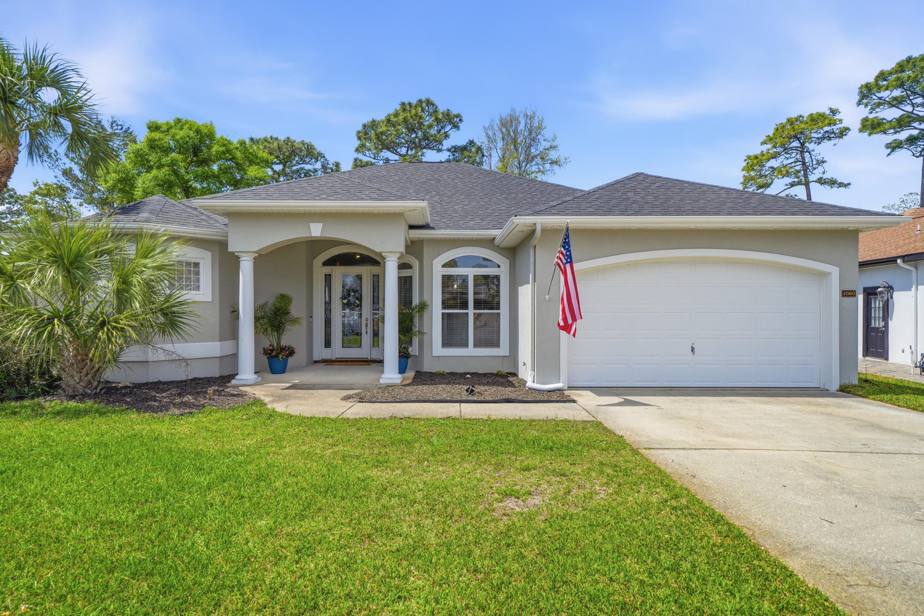 ***OPEN HOUSE:  Saturday, 6/13, 10:00 - 2:00!***  {VA LOAN ASSUMPTION AVAILABLE!} 1080 Napa Way is *THE* stunning BLUEWATER BAY home that you've been searching & waiting for! This home is a MUST SEE IN PERSON and is located in the highly coveted and very well established subdivision of Chardonnay Estates where the gorgeous beaches of Destin are less than 7 miles away! Enjoy living in one of the most desirable areas of Niceville with top-rated schools & easy convenience to Eglin AFB, Army 7th Group, and the Naval EOD school! Nestled inside a cul-de-sac with underground utilities, you'll find this exceptional and immaculately maintained home that's sure to please! You'll love & appreciate all it has to offer - especially all the notable features such as a thoughtful open & split floor-plan, 2 living room spaces, 2023 roof, 2021 water heater, 2018 HVAC, brand new carpet in all 3 bedrooms, tile throughout the main living areas, and neutral color paint in all rooms. The openness & spaciousness this home offers allows an easy transitional flow from one room to the next that's perfect for entertaining your family & friends! The kitchen truly is the heart of this home and boasts granite countertops and stainless steel appliances. Just off the kitchen is the laundry room and pantry. (The less than 1 year old washer & dryer convey!) The kitchen overlooks the eat-in nook along with the cozy family room that's highlighted by a gas fireplace. The living room is open to the beautiful large dining room in the front of the home near the foyer. The tranquil & expansive primary bedroom and bathroom allow you to relax in both comfort, space, and style. The primary bathroom features tile flooring, a separate shower, a separate tub, separate vanities, a separate toilet room, and a large primary closet. Several areas of the home allow you to enter/exit the covered & screened-in back porch where you can can enjoy & entertain within it or access the spacious backyard that's fully privacy fenced and has ample room for a pool. You'll be pleased to know that the irrigation is from a well pump and not city water! Multiple trees and shrubs have been removed to allow more space for enjoyment. This home allows you to feel at ease knowing you get to just relax and just enjoy being home! The following items are all gas: fireplace and an outdoor stub for grilling. Sellers have a termite contract with Bryan Pest Control. HOA fee is only $134 per quarter. Don't miss your chance to own this stunner of a home! Schedule your private tour today!

***Yearly termite contract with Bryan Pest Control is $325 per year and renews in August 2026.

~VERY Close By Locations:
****White Point Road - Maxwell Gunter Mid-Bay Shores Recreation Area is less than a mile away! Enjoy walking/hiking trails, swimming in the bay, fishing from the shore, relaxing & laying out on the sand, launching kayaks/canoes/paddleboards, or just having a picnic by the water! It's a great local spot to enjoy!!! 

(1.) Beaches of Destin are just 6 miles away! Just over the mid-bay bridge takes you to "Crystal Beach" where there are several public beach access locations by Camille's and Crab Trap. The Back Porch is another favorite public beach. A local's favorite is Henderson Beach State Park where you can pay to have a yearly membership for ample parking, pavilions, and bathrooms! (Military receive discounts for the membership! Check out www.floridastateparks.org for more info!)
(2.) Bluewater Elementary School is 2.5 miles from this home!
(3.) 6 miles away are both Ruckel Middle School and Niceville High School! These schools are located right next to each other and are across the street from the Niceville Children's Park (free access) and Niceville Library.
(4.) Fred Gannon Rocky Bayou State Park is located 3 miles away and is a local favorite spot to launch boats! You can purchase a yearly membership. (Check out www.floridastateparks.org for more info and military discounts!)
(5.) Bluewater Bay has 3 separate swimming pool facilities that are all part of a membership that you can pay for to be a part of through Recreation Services, Inc. All 3 pools are located within close proximity to this home! It's just 1 mile to the Woodlands Pool, 3.5 miles to the Bay Drive Pool, and 2.5 miles to the Glen Eagles Pool. (Check out www.bluewaterbayfl.com for more info!)
(6.) The Golf Club at Bluewater Bay is 2 miles away. (Check out bwbresort.com for more info.)
(7.) Just 2.5 miles from this home is the Emerald Coast Pickleball courts and 3 miles away is the Emerald Coast Tennis Center. The tennis center's location (777 Bay Drive) only has tennis courts at it, but the pickleball courts are located right down the road at 1200 Oakmont Drive. (The pickleball courts are directly next to the Glen Eagles Pool which is one of the 3 pools of Bluewater Bay. The pickleball membership and the pool membership can be purchased through their separate businesses. They share access to the bathrooms located by the pool and pickleball courts. (Check out www.bluewaterbayfl.com for more info about ECT Management!)
(8.) Eglin Air Force Base back (east) gate is just 10 miles away and the front (main) gate is only 14 miles away.
(9.) It's 19 miles to Hurlburt Field Air Force Base's back gate and 25 miles to the front gate.
(10.) This home is just 22 miles to Army 7th Special Forces Group Soldier Support Center compound.
(11.) The Naval School Explosive Ordinance Disposal base is the closest military base distance to this home! It's only 2.5 miles away.
(12.) Winn-Dixie (grocery store) is only 2 miles away.
(13.) It's only 5 miles to Publix and just 6 miles Walmart.
(14.) Just 2 miles to Ciao Bella/Bella Blue Bar, Tisano's, Sabina's Europa, Schnitzel & More, Thai Ladda, Amor & Taco's Mexican Kitchen and Cocina, Brother's Kitchen, Tango 3 Coffee Roasters Hurricane Grill & Wings, and Pepito's Mexican Restaurant.
L. J. Schooners Dockside Restaurant & Oyster Bar is only 4 miles away!