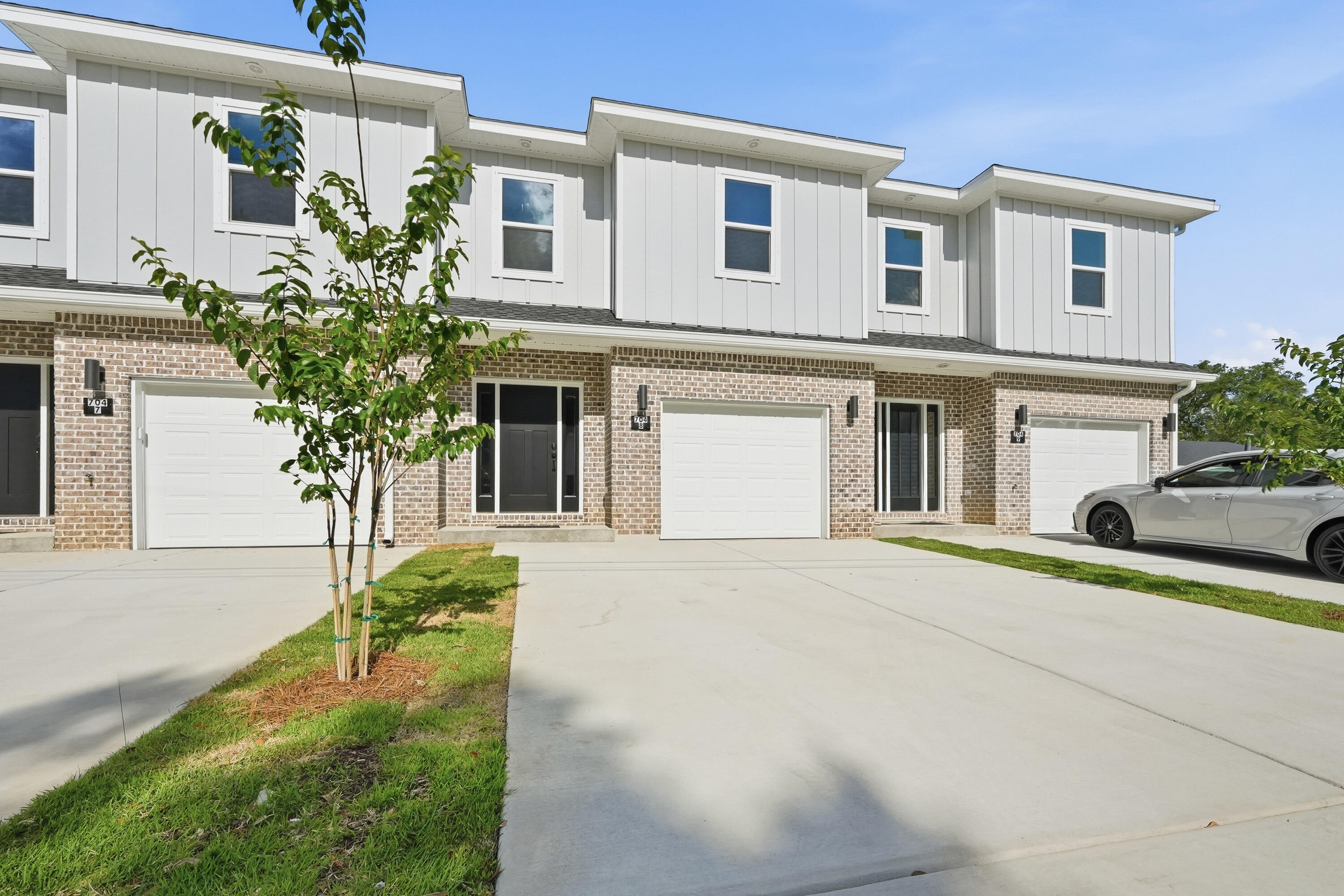 New Construction! END UNIT. $8,500 ANYWAY MONEY! 2-10 Builder Warranty, Termite Bond Renewed annually by HOA. Luxury Vinyl Plank throughout. Upstairs enjoys 4 bedrooms, 1 full guest bath, 1 on-suite bath for primary, & laundry room. Downstairs foyer leads to ½ bath, kitchen w/ breakfast peninsula & Stainless Appliances to include side by side refrigerator, Self-Cleaning Convection Stove, built-in microwave/range hood & dishwasher. Kitchen has quartz counters & tiled backsplash for modern vibes. Kitchen opens to the living & dining room. Elevated lighting & mirrors finish off the home. Back door leads to privately fenced backyard with a gate which opens to a water retention area brilliantly used as an unofficial dog park for owners. Apoxy Sealed Garage Flooring for a final touch.