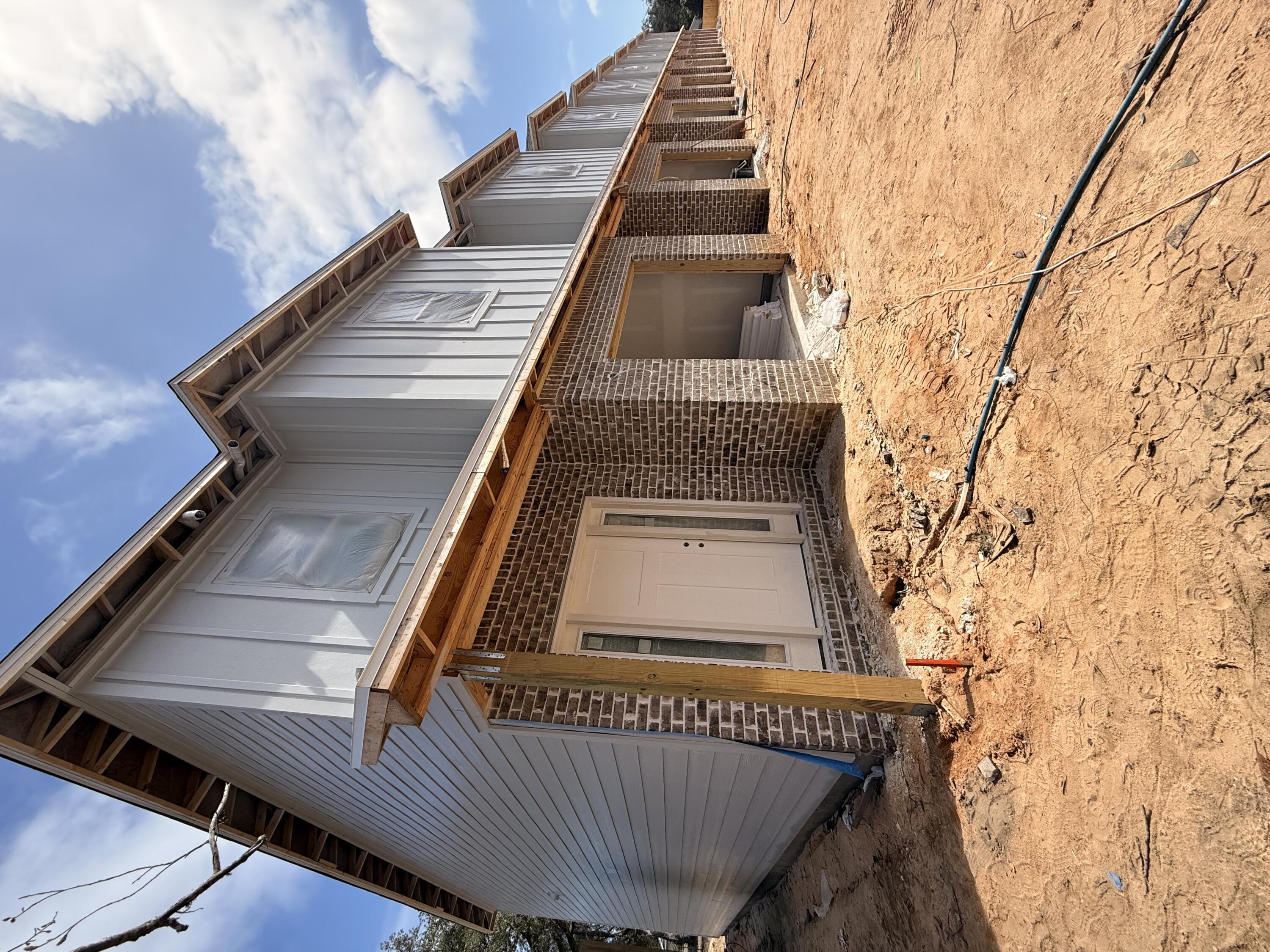 New Construction! END UNIT. $8,500 ANYWAY MONEY! 2-10 Builder Warranty, Termite Bond Renewed annually by HOA. Luxury Vinyl Plank throughout. Upstairs enjoys 4 bedrooms, 1 full guest bath, 1 on-suite bath for primary, & laundry room. Downstairs foyer leads to ½ bath, kitchen w/ breakfast peninsula & Stainless Appliances to include side by side refrigerator, Self-Cleaning Convection Stove, built-in microwave/range hood & dishwasher. Kitchen has quartz counters & tiled backsplash for modern vibes. Kitchen opens to the living & dining room. Elevated lighting & mirrors finish off the home. Back door leads to privately fenced backyard with a gate which opens to a water retention area brilliantly used as an unofficial dog park for owners. Apoxy Sealed Garage Flooring for a final touch.
