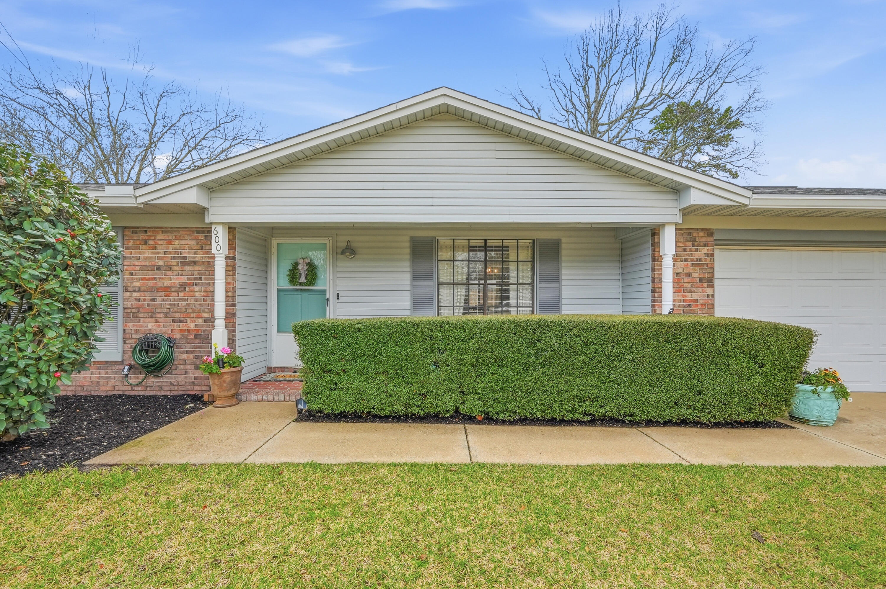 Beautifully updated 4-bedroom home on a spacious corner lot in the heart of Destin! Enjoy peace of mind with a 2020 Roof, 2021 HVAC, fresh interior paint, new exterior door, and a brand-new guest bathroom vanity. The inviting living room flows seamlessly into the dining area and kitchen, creating an ideal layout for everyday living and entertaining. A flexible 4th bedroom or office sits just off the dining space, while three additional bedrooms are tucked away on the opposite side of the home. Enjoy the Florida weather year-round in your oversized private backyard, or take a short bike ride or walk to some of Destin's world famous nearby dining and shopping. Throughout the year you can enjoy two producing pecan trees, and stunning camellias, hydrangeas, roses, and azaleas! At Christmas, Sea Oats Drive is transformed into Candy Cane Lane for all ages to enjoy some extra holiday magic! Reach out to your favorite agent today schedule a private showing!