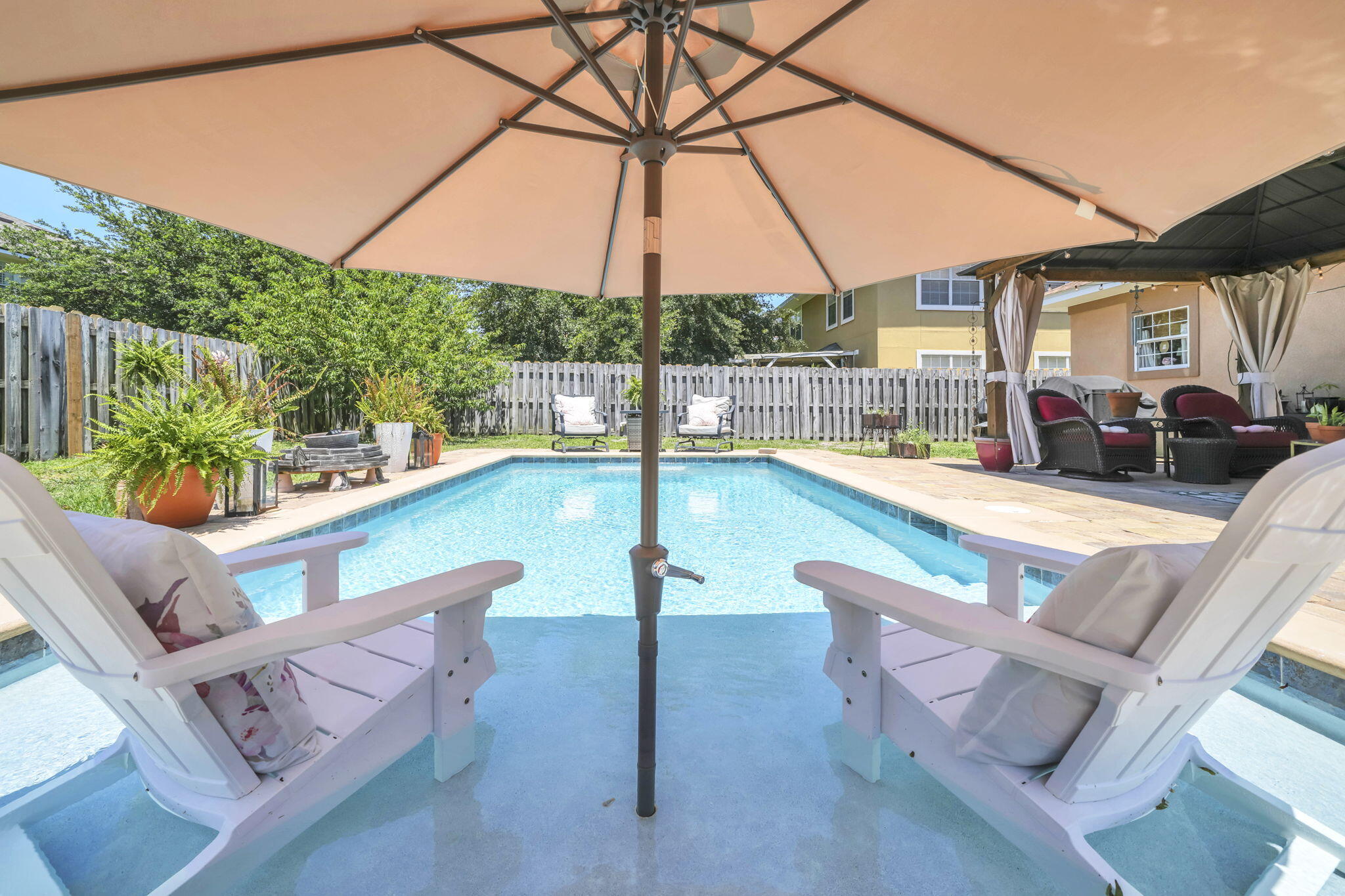 **MOTIVATED SELLER**Beautiful 4-bedroom, 3-bath home in the desirable Driftwood Estates community featuring 2,244 square feet of well-designed living space and a backyard oasis with a private pool added by the current owners. The open floor plan offers a spacious living area ideal for entertaining, while the kitchen features stainless steel appliances, abundant cabinet and counter space, pantry storage, and a large eat-in dining area with direct access to the covered patio and backyard. The upstairs primary suite includes a garden tub, separate shower, double vanity, and oversized walk-in closet. The fully fenced backyard provides exceptional outdoor living space for relaxing, grilling, and entertaining. Driftwood Estates offers ponds, a neighborhood park, and a convenient location near Choctawhatchee Bay, shopping, dining, Grand Boulevard, Sacred Heart Hospital, and the Emerald Coast's white sand beaches.