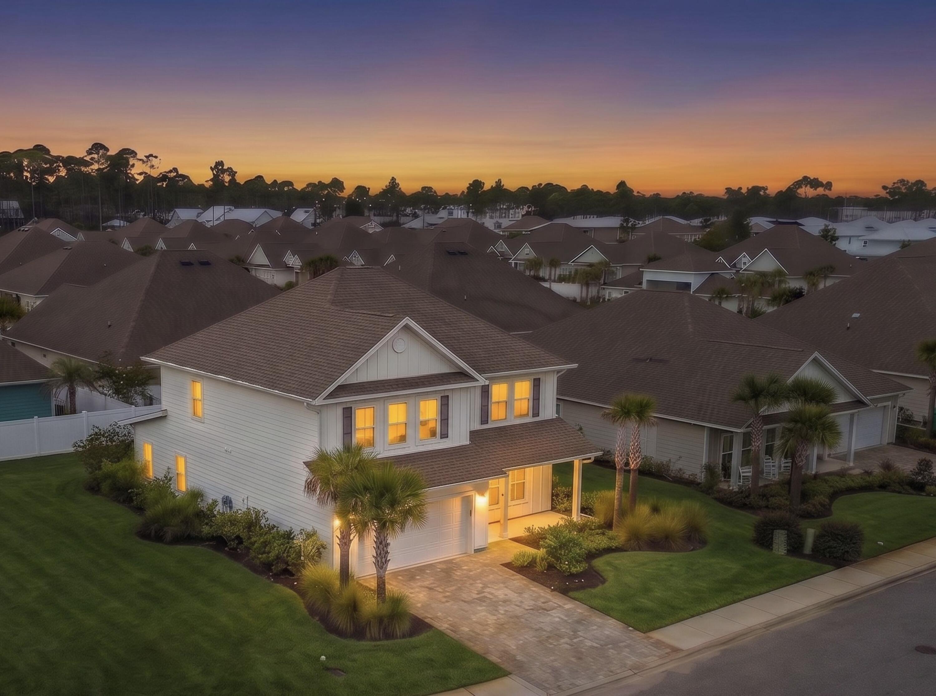 Positioned south of Highway 98 in the gated enclave of Lakeview Estates, this 4-bedroom, 3.5-bath residence enjoys one of South Walton's most desirable locations -- close enough to hop on a golf cart or bike for an easy ride to the sugar-white sands of 30A. The community's gated entry offers a quiet reprieve from through traffic, while a scenic walking path connects residents directly to Helen McCall Park, and a generously sized community pool serves as a favorite gathering spot for neighbors to unwind and connect.

Set on a spacious corner lot, the home itself offers an open-concept floor plan where living and dining areas flow effortlessly into a well-appointed kitchen -- a layout made for both quiet evenings and easy entertaining. Abundant natural light fills the home through large windows throughout. The first floor is thoughtfully designed with a private master suite, a powder bath for guests, and access to the two-car garage. Upstairs, a versatile loft awaits its next chapter -- envision a second family room, game room, media space, home office, or children's play area. Two additional bedrooms share a convenient Jack-and-Jill bath, while a fourth bedroom enjoys its own dedicated bath. A second-floor laundry room adds everyday ease within easy reach of every bedroom.

Beyond its gates, Lakeview Estates places residents within easy reach of Scenic Highway 30A's white-sand beaches, boutique shopping, celebrated dining, and endless outdoor recreation. Whether embraced as a primary residence or a coastal second home, this property offers a rare combination of space, thoughtful design, and an ideal South Walton location.