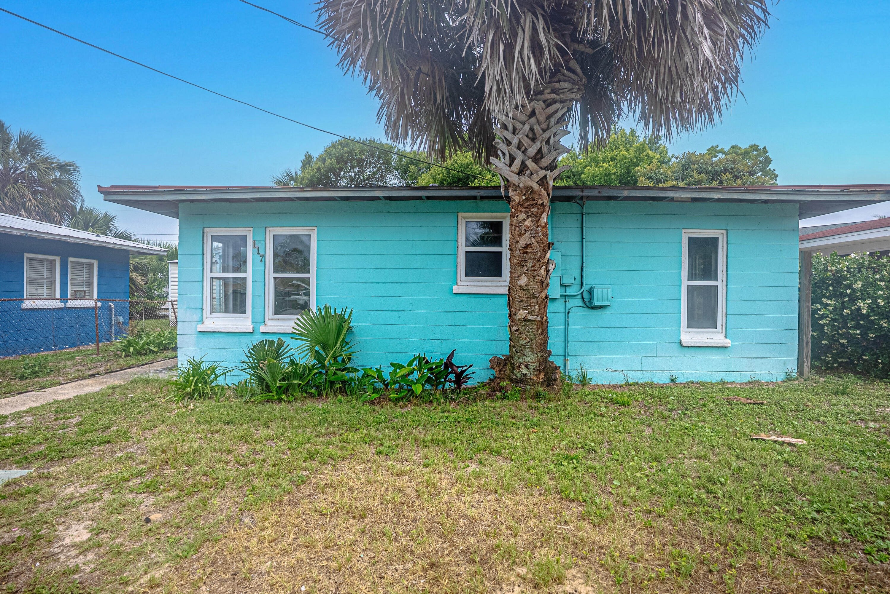Located in the heart of Laguna Beach, this charming 2 bedroom cinder block cottage offers an incredible opportunity. Featuring tongue and groove ceilings, terrazzo floors, and a location just one block from the Gulf, this property is full of character and potential. Whether you're looking to make a few updates or take on a full renovation, this home offers solid bones and the chance to create the perfect beach retreat or short term rentalLaguna Beach is known for its laid-back coastal lifestyle, golf cart-friendly streets, locally loved spots like Thomas Donuts & Ice Cream Shop and the Carousel grocery store, and miles of beautiful protected shoreline. Conveniently located just minutes from Pier Park, and new attractions like Dolly Parton's Pirates Voyage and TopGolf, approximately 10 minutes from 30A, and about 22 minutes from Northwest Florida Beaches International Airport, this location offers easy access to dining, shopping, entertainment, and travel. Whether you're searching for a primary residence, vacation home, or investment opportunity, this property is full of possibilities. Come see it today! CASH ONLY
