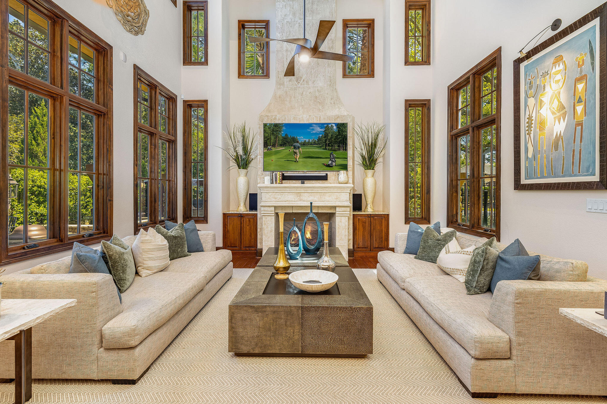 Experience the refined elegance and luxurious amenities of this stunning Tuscan Villa-inspired residence. Positioned near the 12th green of the Raven golf course, the home is thoughtfully designed to maximize breathtaking views through window-wrapped circular rooms and spacious outdoor living areas. This home is ideal for hosting large gatherings, offering a dedicated wine room and two expansive kitchens. The primary kitchen boasts Viking appliances and a convenient breakfast bar,  The second kitchen, located in the Sun Room, is a chef's dream, equipped with a 13-foot commercial-grade Twin Eagle Teppanyaki grill, a Twin Eagle BBQ grill, and a powerful Twin Eagle 60,000 BTU burner, all made from high-grade stainless steel and enhanced with LED lighting. The Primary suite serves as a LED lighting. The Primary suite serves as a private retreat, featuring an ensuite bathroom with a relaxing steam shower, a cozy fireplace, a comfortable sitting area, a dedicated study, and a balcony that overlooks the scenic golf course. Beautifully landscaped outdoor spaces that include a fountain and fire pit, provide the perfect setting for entertaining guests or simply unwinding in a tranquil environment.  Located on the premier Golf Course Lot in Tuscana inside the Sandestin Golf & Beach Resort, this home is convenient to the very best shopping, dining, Beaches, Golf, Tennis, Pickleball, Marina, Boating, and year-round events!