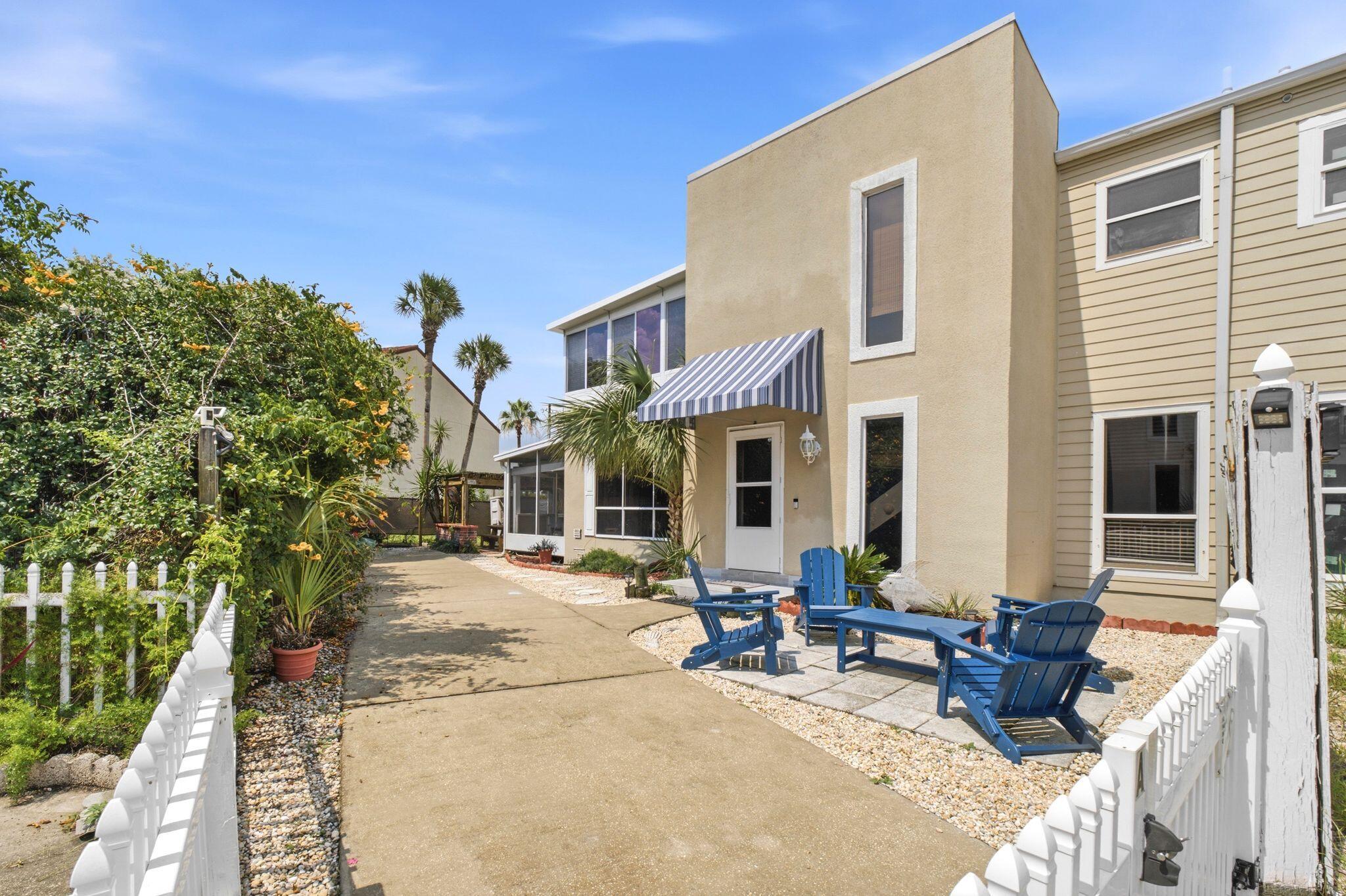 Whether you're spending the day on the water or meeting friends for dinner, everything you love about the Emerald Coast is just minutes from your front door. Tucked away on a quiet street on Okaloosa Island, this beautifully updated 3-bedroom, 2-bath townhome offers the perfect blend of coastal living and investment potential. Walk or bike to the beach, the Okaloosa Island Pier, The Boardwalk, waterfront restaurants, and local entertainment while enjoying the convenience of an unbeatable island location.

Inside, you'll find a flexible floor plan with an upstairs bonus room featuring water views -- ideal as a bunk room, second living space or game room. Outdoor living shines with a screened porch complete with a built-in bar, pergola, and spacious deck, perfect for entertaining or unwinding after a day at the beach.

One of the property's biggest advantages is its flexibility. With no HOA, short-term rentals allowed, and ample parking, including space for a boat, this property offers a rare combination of freedom and functionality. The owners have invested approximately $50,000 in updates, including a newer roof, HVAC, flooring, bathrooms, interior paint, appliances, fencing, and screened porch.

Offered fully furnished with a proven rental history, this move-in-ready home is ideal as a primary residence, vacation getaway, or income-producing investment on the Emerald Coast.