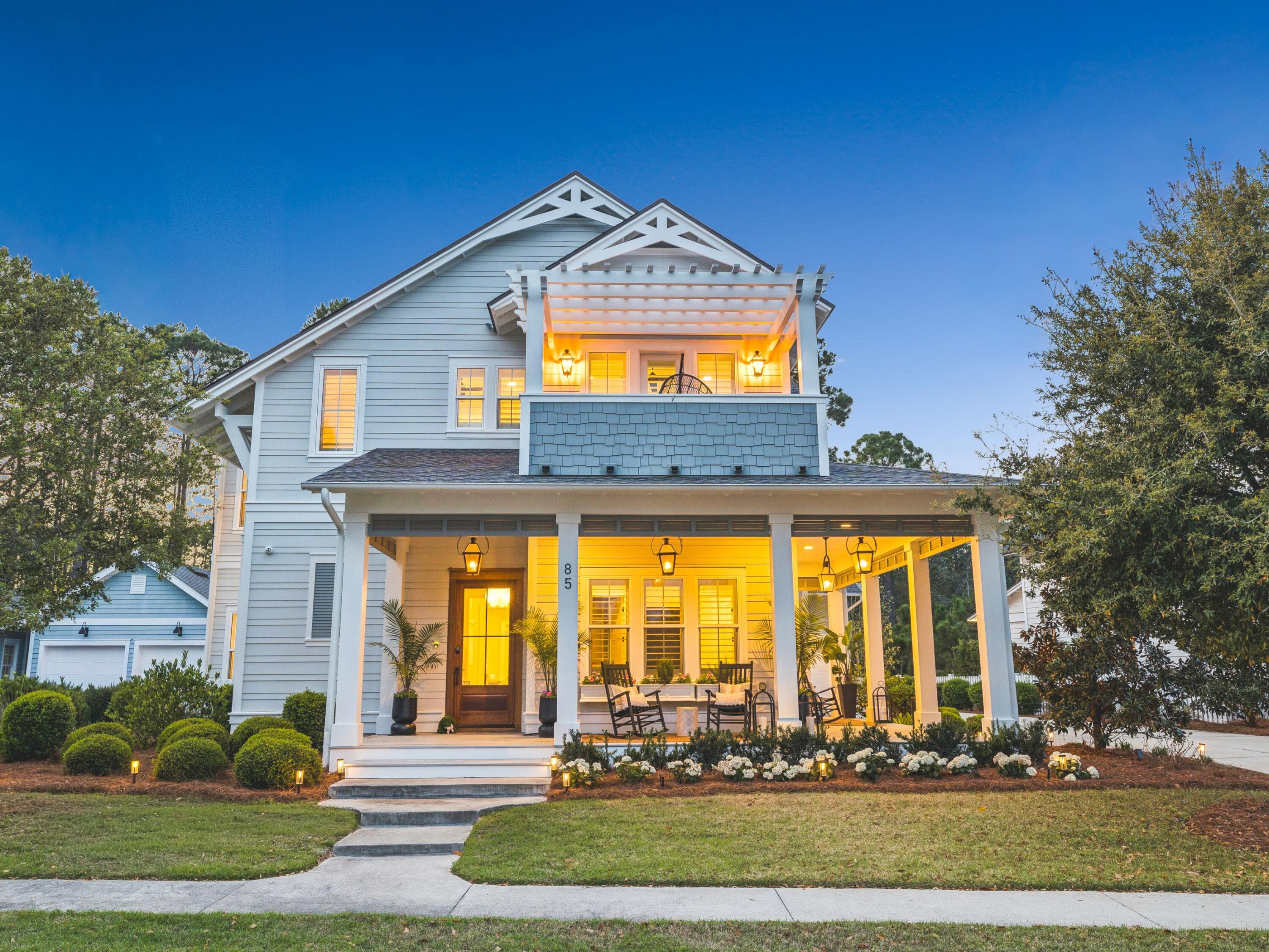 Where luxury meets effortless coastal living, this 4,394-square-foot custom residence unfolds with a quiet confidence, where every detail has been thoughtfully considered and every space invites you to slow down and stay awhile. From the moment you arrive, the wraparound porch sets the tone, offering a warm, welcoming introduction that feels both refined and relaxed.
Inside, natural light pours through expansive windows, illuminating soaring ceilings and a seamless, open-concept design. The kitchen anchors the home as both a gathering place and a showpiece, outfitted with premium appliances, custom cabinetry, and a generously sized butler's pantry that keeps everything effortlessly within reach while maintaining a clean, elevated aesthetic. The main level offers a well-appointed guest suite, creating a private and comfortable space for visitors, while the rest of the home unfolds with an easy, intuitive flow designed for both everyday living and entertaining.
Just beyond the doors, the backyard transforms into a private retreat. Fully fenced and backing to a serene wooded setting, the outdoor space feels tucked away and protected. A saltwater pool becomes the centerpiece, complemented by a summer kitchen and a covered lounge with a fireplace, where evenings linger a little longer and gatherings come together with ease.
Upstairs, the primary suite is designed as a true escape, where mornings begin softly and evenings wind down in a spa-inspired bath and expansive custom closet. Additional guest rooms, a charming balcony, and a detached carriage house offer flexibility for hosting, working, or simply creating space to spread out.
Set within Watersound Origins, the home is part of a community that balances natural beauty with thoughtful design, offering access to golf, dining, and the nearby beaches of 30A. It's a place where the pace feels just right, and where everyday living carries a sense of ease, intention, and understated luxury.