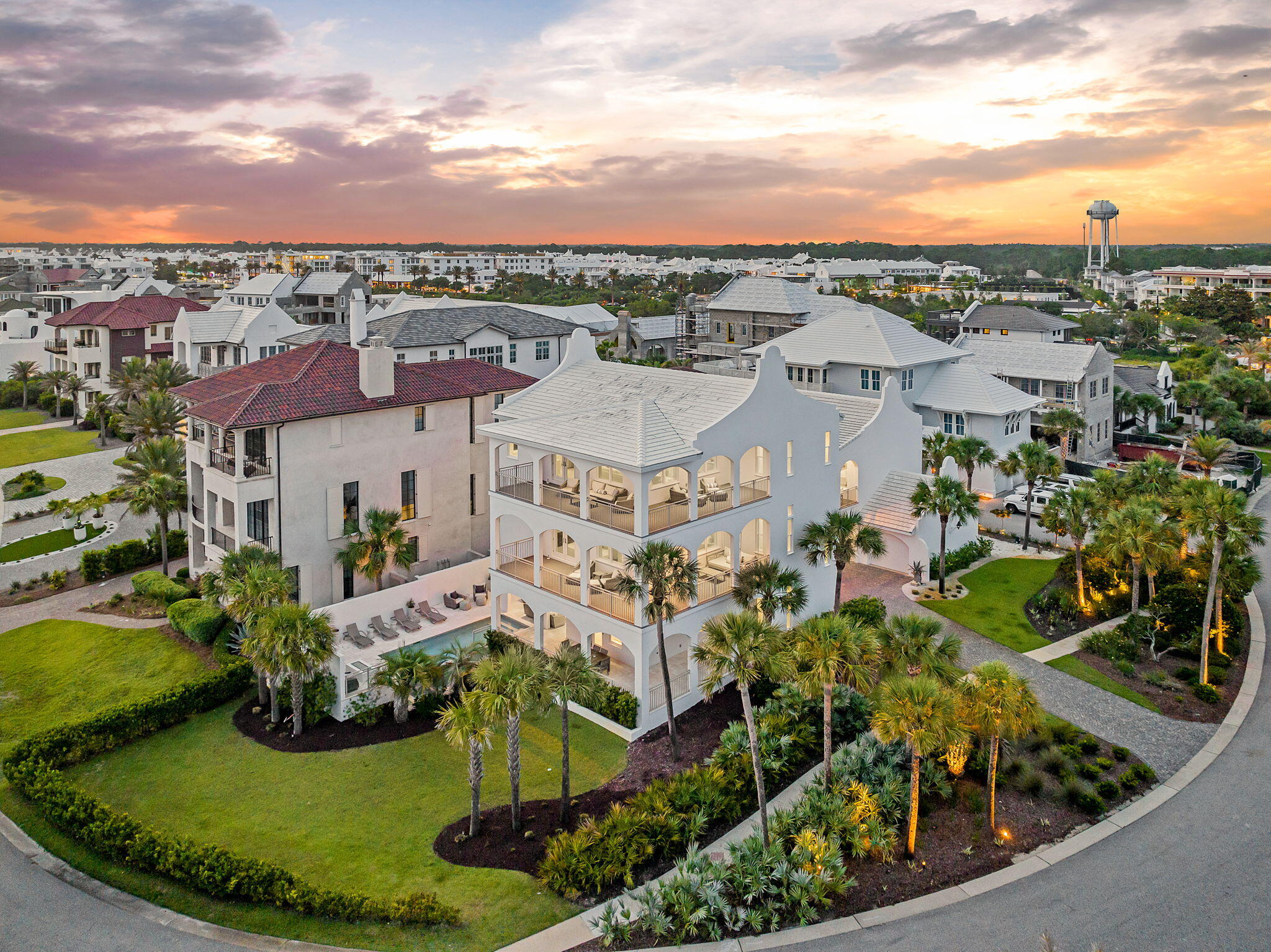 Reintroducing 124 Paradise by the Sea Blvd -- a masterpiece of coastal elegance, newly reimagined with a full-scale designer refurnishing that redefines luxury on 30A. Tucked behind the exclusive gates of Paradise by the Sea, this extraordinary 6-bedroom, 5.5-bath estate now marries architectural grandeur with elevated interiors curated for the most discerning buyer.

Perfectly poised between the world-renowned communities of Rosemary Beach and Alys Beach, yet cocooned in complete privacy, this estate spans multiple levels of expansive living and entertaining space. From the moment you enter, every detail -- from bespoke furnishings and layered textures to coastal-inspired finishes -- speaks to effortless sophistication and relaxed grandeur.

Step onto one of the home's vast balconies and drink in breathtaking views of the emerald Gulf waters, or escape to your private pool and courtyard, a tranquil retreat surrounded by lush landscaping. A spacious yard offers plenty of room for outdoor gatherings, while your deeded beach access places the sugar-white sands just moments away.

Inside, an elevator connects all levels for ease and comfort, while the charming carriage house, connected by a breezeway, offers an inviting and fully furnished guest sanctuary, ideal for extended family or VIP guests.

This is more than a home, it's a lifestyle statement. All nestled within a guard-gated enclave with layers of security for peace of mind.

If you've been waiting for a turn-key, luxury coastal estate that seamlessly blends privacy, design, and walkability to everything 30A offers, this is it.