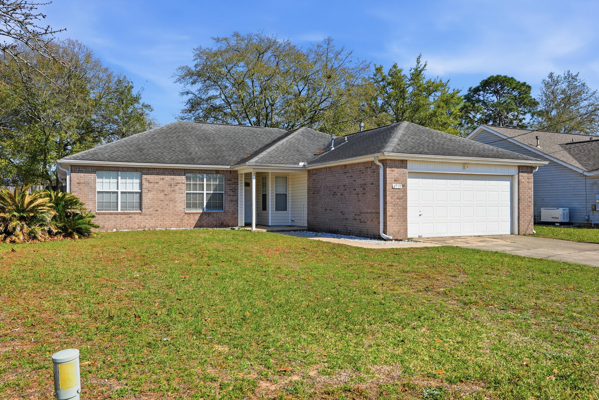Welcome home to Sugar Creek, one of South Crestview's most established, family-friendly neighborhoods. This spacious 4-bedroom, 2-bath home features vaulted ceilings, tile and wood flooring throughout, and a kitchen with a breakfast bar and updated appliances. The master suite includes a walk-in closet and double vanities. Enjoy a privacy-fenced backyard, open patio, and attached garage. Move-in ready and priced to sell. Minutes from Duke Field, Eglin AFB, top-rated Okaloosa County schools, and everyday shopping with Destin's beaches less than an hour away.