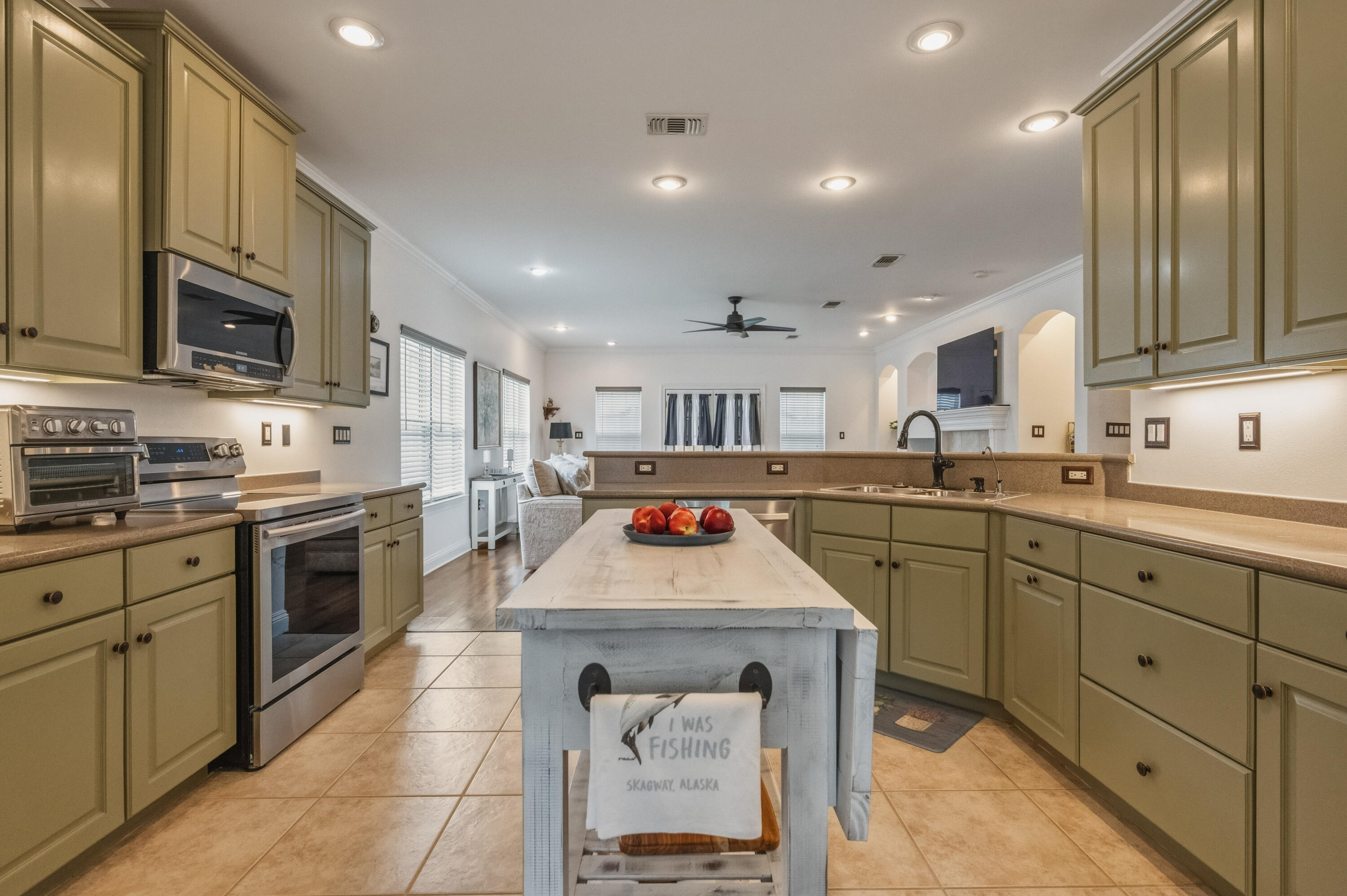 Welcome to 1601 Mallorca Cove, a beautifully maintained 3-bedroom, 2-bathroom home nestled in the sought-after Magnolia Plantation in Niceville, FL. The big-ticket items are already taken care of with a new roof (2021), HVAC (2022), and water heater (2020), so you can move in with complete confidence. Luxury vinyl plank flooring runs throughout the main living areas, offering durability and a clean, modern aesthetic, while fresh paint from floor to ceiling and freshly painted cabinetry throughout the entire home give the interior a crisp, updated feel. New ceiling fans add comfort and style, and new ADA-compliant toilets have been installed in both bathrooms. The primary suite features plush new carpet, new lighting, a new lighted mirror, and a beautifully updated bath, while the second bathroom shines with a new shower surround and its own new lighted mirror. Step outside into a private backyard retreat where new fencing encloses the yard, low-maintenance artificial turf keeps things green year-round, and a private putting green and hot tub make entertaining effortless. A new side brick path adds charm and function, and a new back slider (installed July 26) opens the space beautifully for indoor-outdoor living. The freshly painted garage door completes the polished look of this exceptional home. Located in one of Northwest Florida's most desirable communities, Magnolia Plantation in Niceville, FL offers top-rated schools, proximity to Eglin AFB, Hurlburt and 7th SFG.