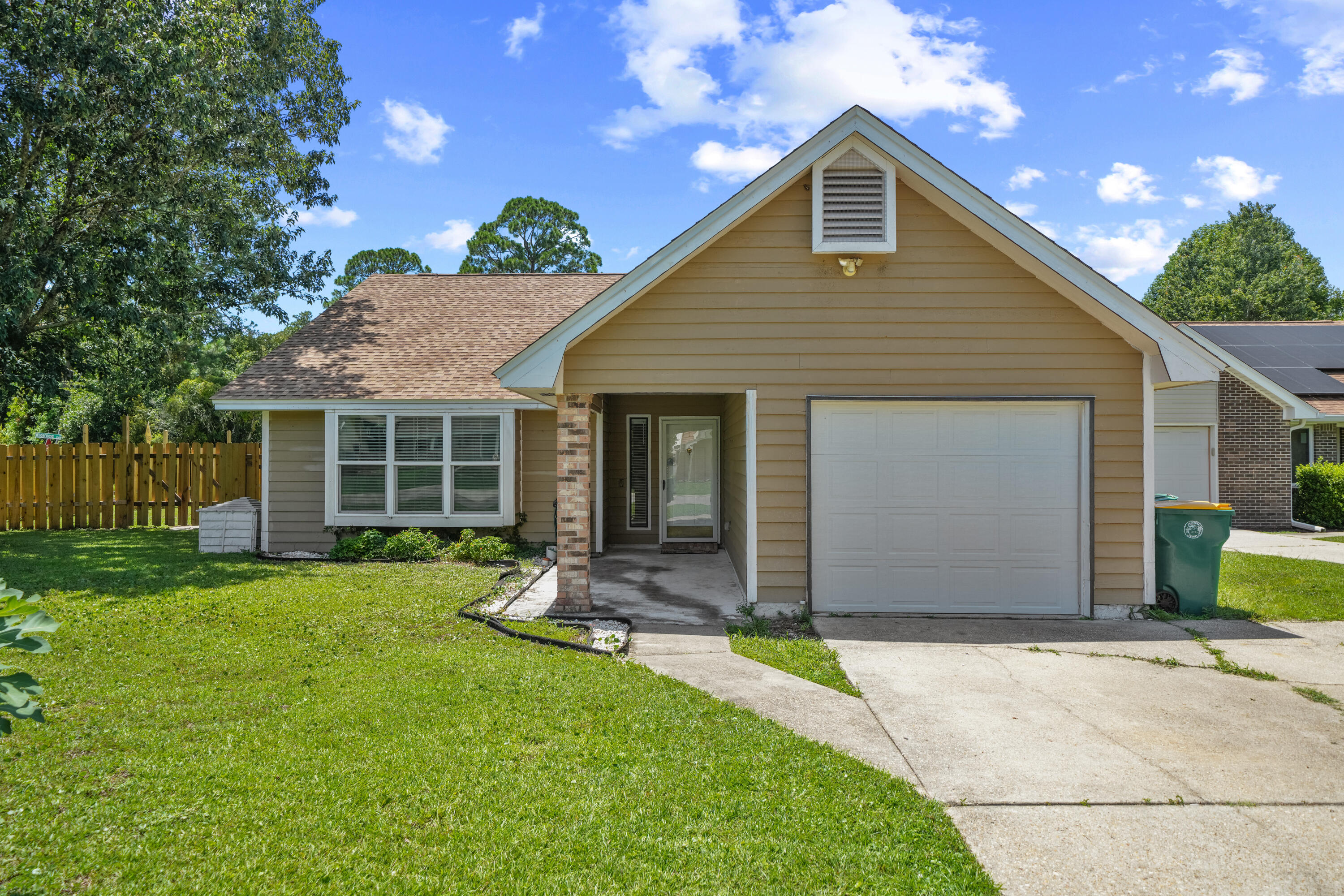Welcome home to this charming 2-bedroom, 2-bath home offering 1,111 square feet and fantastic curb appeal! Situated on a desirable corner lot, the property is fully fenced and surrounded by gorgeous mature trees that add character and shade. Inside, you'll find a comfortable, easy-to-maintain layout, while the pretty screened-in back patio provides the perfect spot to relax, enjoy your morning coffee, or unwind at the end of the day. The convenient location offers easy access to Northwest Florida's Air Force and Army installations, as well as shopping, dining, and everyday necessities. With its inviting exterior, beautiful trees, fenced yard, corner-lot setting, and screened outdoor living space, this home is ready for its next chapter. Schedule your showing today!