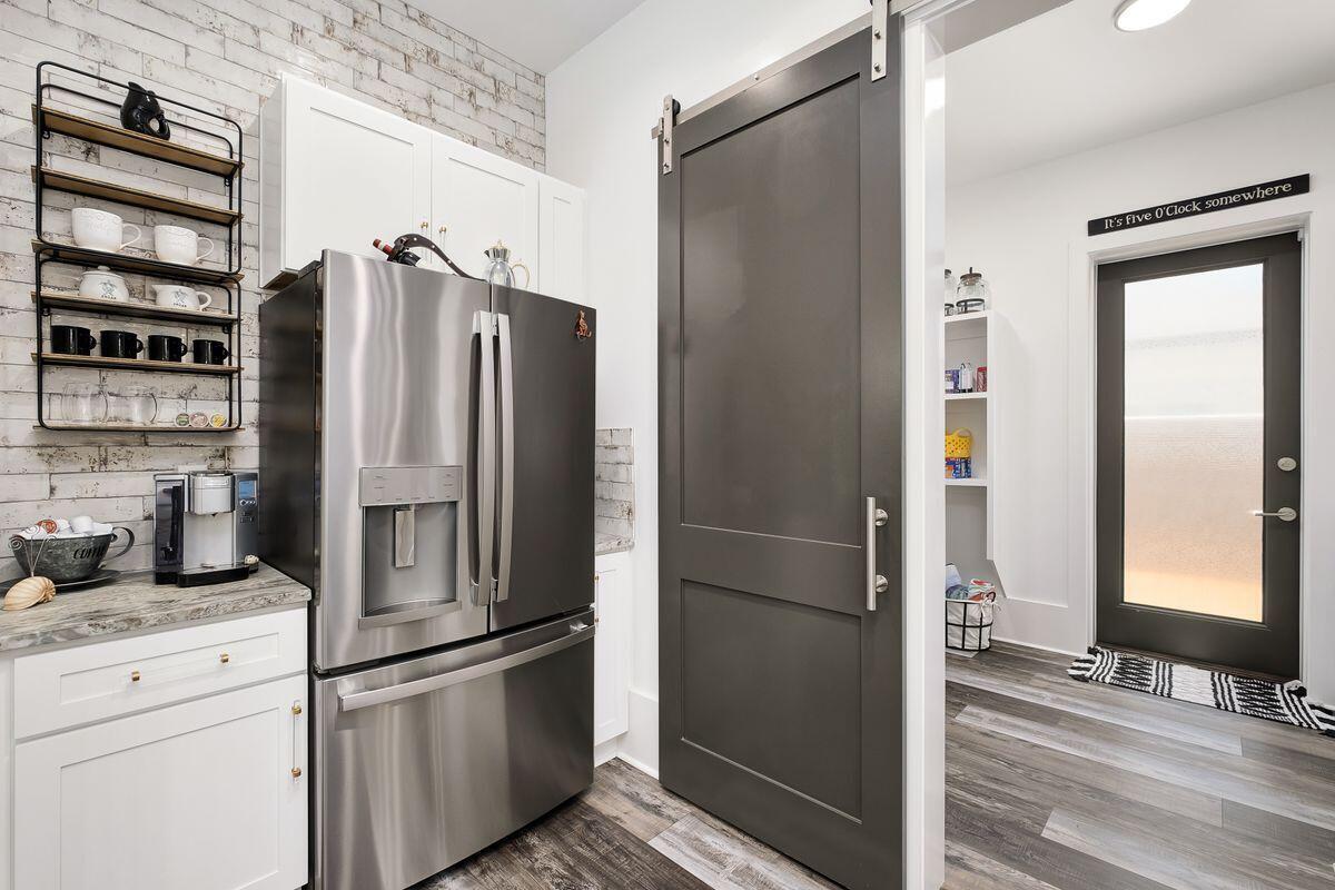 BRING AN OFFER!   NO HOA!! STUNNING CUSTOM HOME NEW IN 2022, POURED SOLID CONCRETE. Did I mention NO HOA FEES IN PRESTIGIOUS FRANGISTA BEACH. CALL LESLIE 850-502-3988  

Only a 5 minute walk to a deeded beach access. Walk into a 28-foot Foyer with open floor plan. See the sparkles from the chandelier when sun lights it up. TWO LARGE LIVING ROOMS.  Each bedroom has its own ENSUITE.  PRIMARY ON MAIN OR SECOND WITH POOL VIEWS.  Kitchen is to die for with Chefs Kitchen and appliances with amazing surprise addons!
A 50lb built in ice machine keeps Parties Alive in the heated Salt Water pool with a 25 foot inside pool bench. Large open pocketed impact slider doors on both levels. 

Home is Sold Furnished with a few exceptions of personal Items and Antiques.  Cost to Own a Concrete Home is MINIMAL AND WILL BE THE HOME WITH NO YEARLY WOOD ROT, HIGH INSURANCE OR ELECTRIC BILLS.  

NO HOA!  NO HOA!