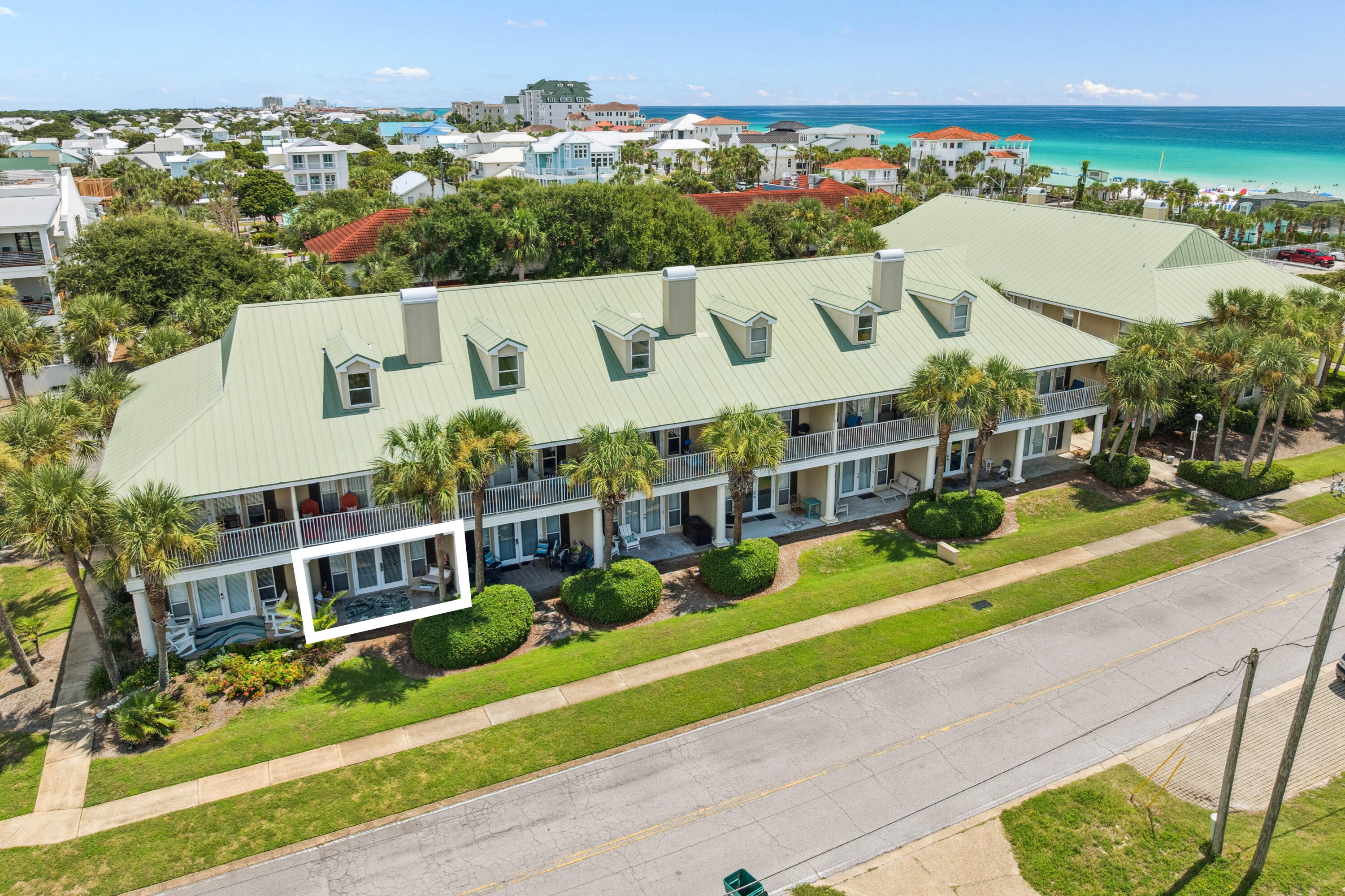 Step into laid-back coastal living at this ground-floor Caribbean Dunes residence, where boho beach style meets everyday comfort. Just a short stroll from the white sands of Crystal Beach, this one-bedroom, one-bath condo makes an ideal primary home, vacation retreat, or rental investment. Inside, the stylishly updated interior showcases a remodeled kitchen and bathroom, new flooring, and stainless steel appliances. The open living and dining area flows seamlessly to a large patio framed by lush landscaping, creating an inviting extension of your living space. Designed to sleep six, the condo includes cozy hallway bunks and a living room sleeper sofa, ensuring plenty of room for family and guests. Caribbean Dunes offers an array of amenities, including a sparkling pool and hot tub, walking and bike paths, and deeded beach access directly across the street. With favorite local restaurants like Camille's and charming shops within walking distance, this property places you in the heart of the Crystal Beach lifestyle.