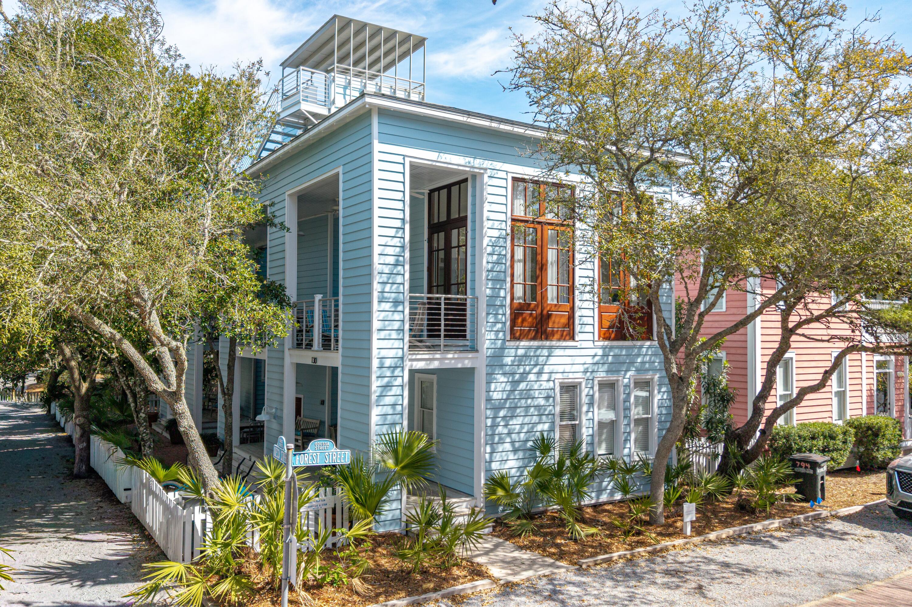 Take a Charleston-inspired home, place it in one of the most prestigious, award-winning communities along 30A, and you'll find ''Just For Fun,'' a recently renovated paradise designed for family enjoyment. Discover the ultimate in residential privacy with this rare corner lot, positioned exclusively at the quiet terminus of a dead-end street. This home offers the coveted benefits of a corner location- extra light and space- without traffic, ensuring an oasis of seclusion. Located in a premier spot across the street from the west end family pool and a quick stroll to the white sand beaches, this property offers the perfect blend of coastal luxury and convenience.
Main house: Grandeur and Coastal Charm 
The first level of the main house features two luxurious king master bedrooms, both with en-suite baths, ensuring maximum privacy for you and your guests. The second floor reveals a grand living room defined by soaring ceilings, flooded with natural light. French doors open to a side porch, blending indoor and outdoor living spaces seamlessly. The kitchen boasts a modern vibe with new quartz countertops and high-end stainless-steel appliances, including a Viking gas range, Liebherr refrigerator, Bosch dishwasher, and built-in Sharp microwave. A newly added half bath and laundry area on this level add to the convenience. The third floor offers a third bedroom with an en-suite bath and a spacious sleeping loft kids will adore. This level also features an owner's storage room. Finally, ascend to the roof-top sun deck, followed by a covered tower, providing the perfect vantage point for spectacular sunsets and gulf views.
Guest Quarters and Outdoor Oasis:
The home features attached guest quarters that can be locked off for privacy or utilized with the main house for extended family or friends. The lower level of the guest house includes a full kitchen, living/dining area, and full bath. The upper level offers a master bedroom, with full bath, a sleeping loft, and a private porch.
Just For Fun:
The brick patio connects both homes, creating an ideal space for dining al fresco. Fully renovated, this home is move-in ready. Experience the best of 30A in this stunning Charleston-inspired home, where luxurious amenities meet a prime, family-friendly location.