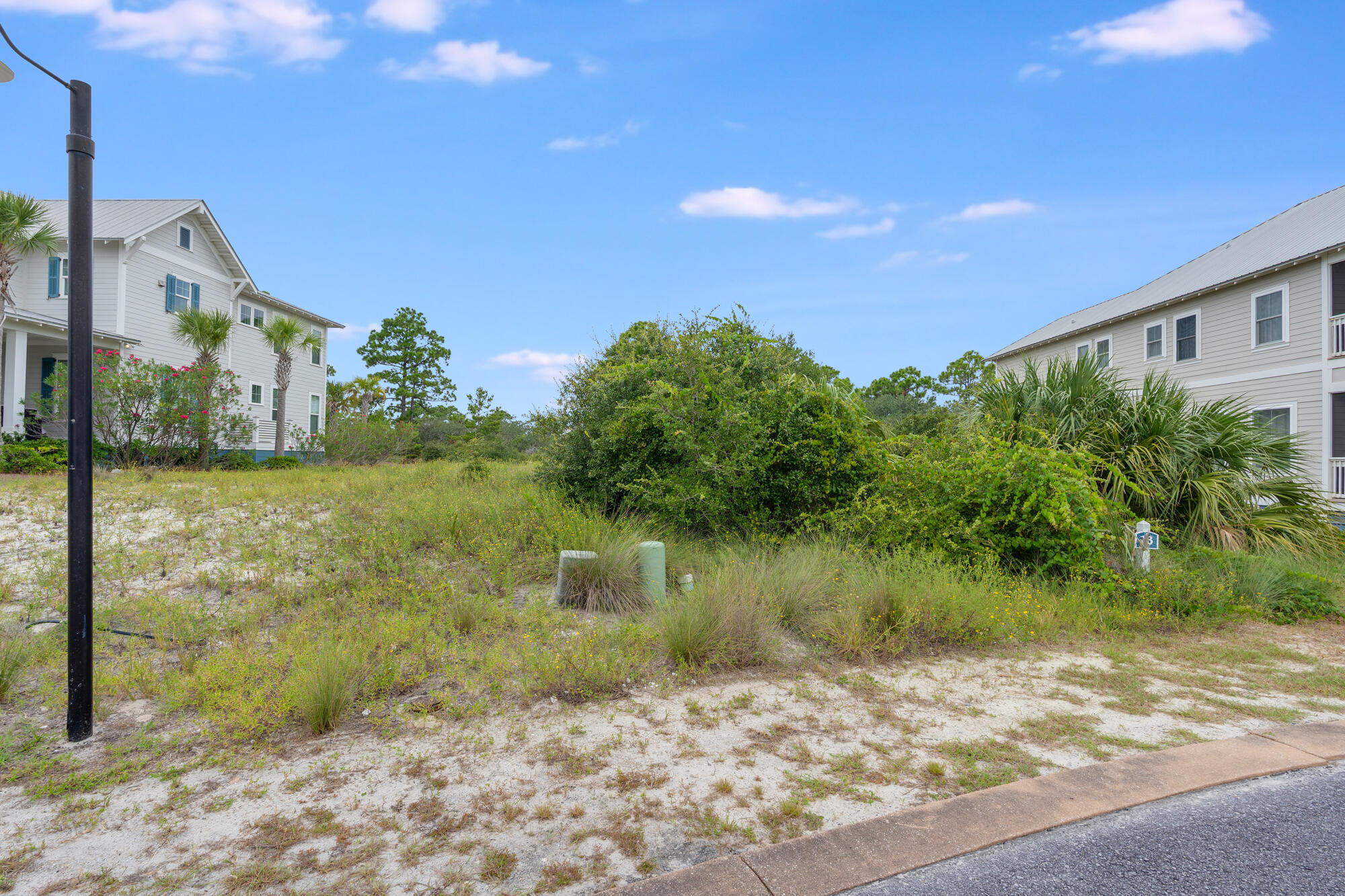 One of the last remaining lots in Jubilation in a very prime location. This platted lot with potential gulf views is located less than 125' from the pool/pavilion and beach boardwalk/access. Also, no backdoor neighbors as the rear property line is contiguous to hundreds of acres of federal land. A westerly sunset over the federal lands is another lifelong bonus! Priced to sell and will not last long! Some dimensions were obtained from the Gulf County Property Appraiser's website. Please verify if important.