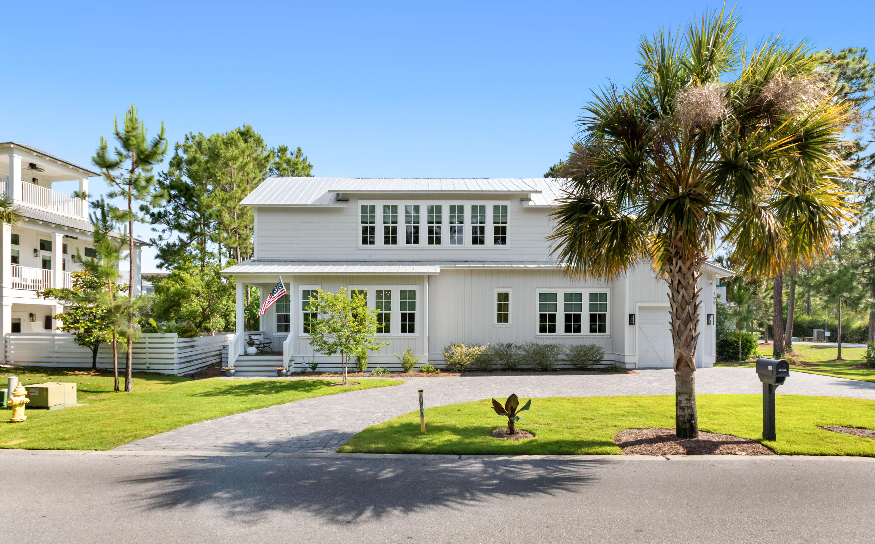 Welcome to Cypress Breeze Plantation, where the beach is close, Gulf Place is easy, and the pool is not playing around.

This furnished three-bedroom, 3.5-bath home sleeps 10, includes a 6-seater golf cart, and is built for simple 30A living. The main-level owner's suite keeps everyday life easy, with double vanities and an oversized frameless glass shower. The open kitchen, dining, and living area gives everyone room to gather, unwind, and come back together after a day at the beach. The outdoor patio adds an easy extra living space, perfect for grilling, cocktails, or slow coffee mornings before heading down to the water. Upstairs, the loft adds flexible space for movie nights, guests, a media room, or the inevitable rainy beach day, with additional sleeping space that helps comfortably accommodate a crowd. Two guest bedrooms each have their own private bathroom, including a bunkroom that sleeps four. Translation: bring the people. There is room.

The home is offered fully furnished and includes two beach bikes. The one-car garage also includes a Tesla charger, because convenient should actually mean convenient.

Getting to Gulf Place, Ed Walline Beach Access, shopping, dining, and live music feels like part of the routine.

Cypress Breeze Plantation is gated and known for one major community flex: its 14,000-square-foot resort-style pool, one of the largest residential pools on the Emerald Coast. The neighborhood also offers food trucks, seasonal events, and easy access to the west end of 30A.