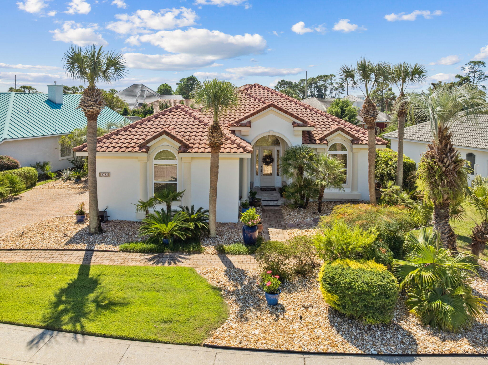 Fully renovated, turnkey beach home in the highly sought-after gated Destiny East community, just a short distance to public beach access. Meticulously maintained as a primary residence, this one-story home is move-in ready and showcases a no-expense-spared modern coastal renovation. Features include a private pool and spa with screened enclosure, open-concept floor plan, high ceilings, custom finishes, and designer interior and exterior lighting. Offered furnished for immediate enjoyment or rental potential. Comparable 4-bedroom homes in Destiny East on rental programs have generated over $80,000 annually. Resort-style amenities include two pools, hot tub, clubhouse with movie theater, fitness center, tennis courts, basketball court, BBQ area, walking trails, and playground.