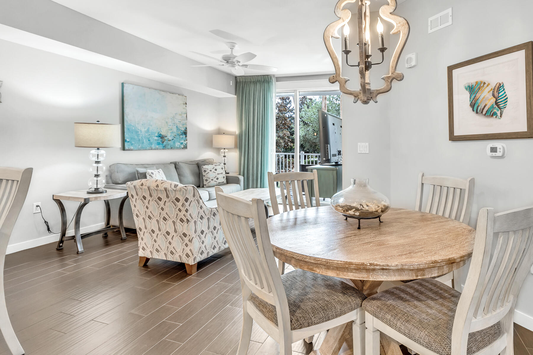 12 MONTH LEASE IN BAYTOWNE WHARF. Fully Furnished & All Utilities Included!! This second floor retreat overlooks the lush lawn area of the Grand Complex. This one-bedroom/one-bath has been thoughtfully refreshed with modern finishes, including updated flooring, designer lighting, and stylish furnishings. Spacious primary bedroom is filled with natural light and offers convenient access to the bathroom and hallway, while the living area features a sleeper sofa to comfortably accommodate additional guests. Community pool  & hot tub. The Village of Baytowne Wharf is a few steps away and features shopping, dining, live entertainment, kids activities, and special events. The Sandestin Marina and Marina Bar & Grill are a short walk and next to tennis courts and bike rentals! Come live the resort life!