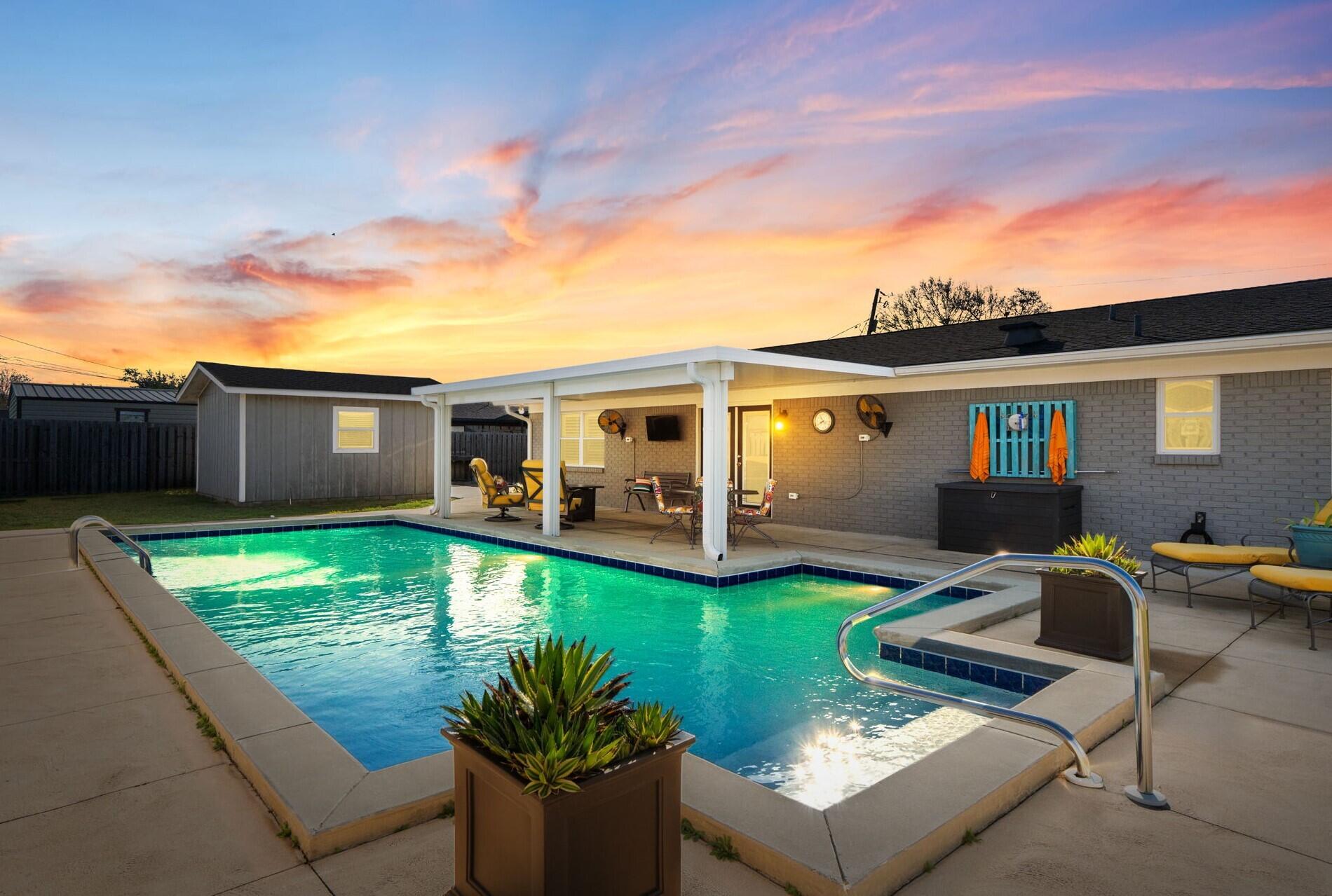 This fully renovated pool home offers exceptional value in a prime location near shopping, dining, and entertainment. Fully renovated to include a new roof (2020) and additional 2024 improvements featuring redesigned living spaces with recessed lighting, a new driveway, and Bahama shutters. The open-concept layout showcases a spacious kitchen with gas cooking, granite countertops, and a center island, while the primary suite includes a private ensuite bath with granite finishes. Outside, enjoy a pool with new pump, covered patio with ceiling fans, and a private fenced backyard perfect for relaxing or entertaining. Additional highlights include a detached workshop- building ideal for a home office or studio, an extended driveway with RV/boat parking and electrical outlet, and convenient access to Tyndall AFB (4 miles), Historic Downtown (5 miles), and the world's most beautiful beaches (25 minutes).