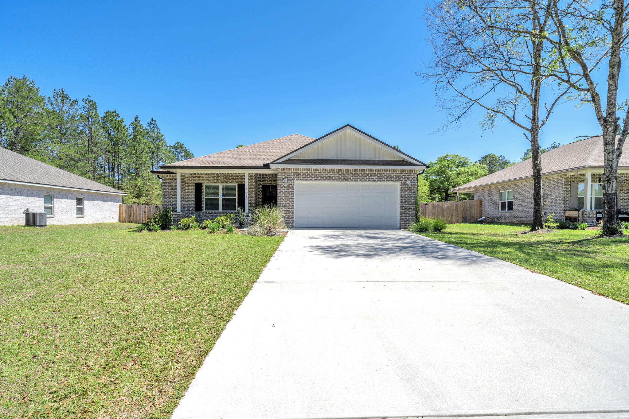 Welcome to your brand-new 2025 built dream home--where thoughtful design meets everyday comfort on a spacious ½-(half acre) lot with full privacy fencing. This beautifully crafted 3-bedroom, 2-bath home offers the perfect blend of style, function, and peaceful living.
From the moment you arrive, you'll fall in love with the full brick exterior accented by a charming board and batten gable, giving this home that timeless modern farmhouse feel. Step inside to an open-concept layout filled with natural light, creating a warm and inviting space perfect for both relaxing and entertaining. The heart of the home features a gorgeous kitchen with quartz countertops, a center island, and a seamless flow into the dining and living areas--ideal for gathering with family and friends. Durable and stylish LVP flooring runs throughout, offering both beauty and easy maintenance.

The spacious primary suite is a true retreat, complete with a dual vanity, walk-in closet, and private bath, while the split floor plan provides added privacy with generously sized guest bedrooms.

Enjoy quiet mornings on the front porch and unwind in the evenings on the back porch overlooking your fully fenced backyard--perfect for pets, play, or even future additions like a pool or workshop.

Additional highlights include:
 2-car garage
 Blinds already installed
 Dedicated laundry room
 Functional, family-friendly layout

=Í Located in a fantastic area offering both space and convenience--this home truly has it all.

=« Whether you're looking for your first home, room to grow, or a peaceful place to settle--this one checks every box.