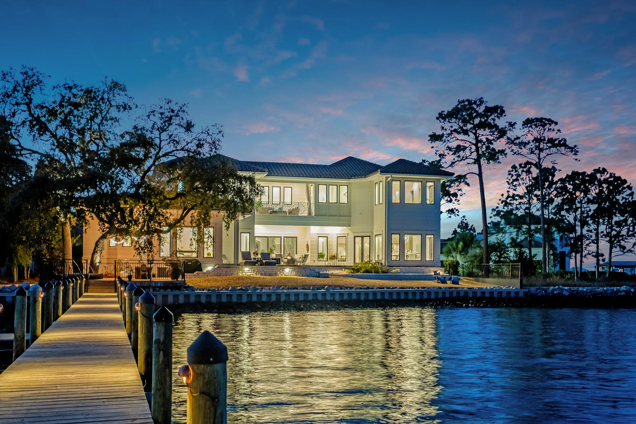 If Bay Fronts the goal this is the home for you!!! This 4 bedroom home provides 180 degree Bay Front views that seamlessly create a transition bringing the outside world in. From amazing sunrises to dolphin sunsets this 2018 Geoff Chick redesign is the perfect blend of privacy, fun and relaxation.

**** Buyer to verify all dimensions and any information deemed important to the Buyer ****