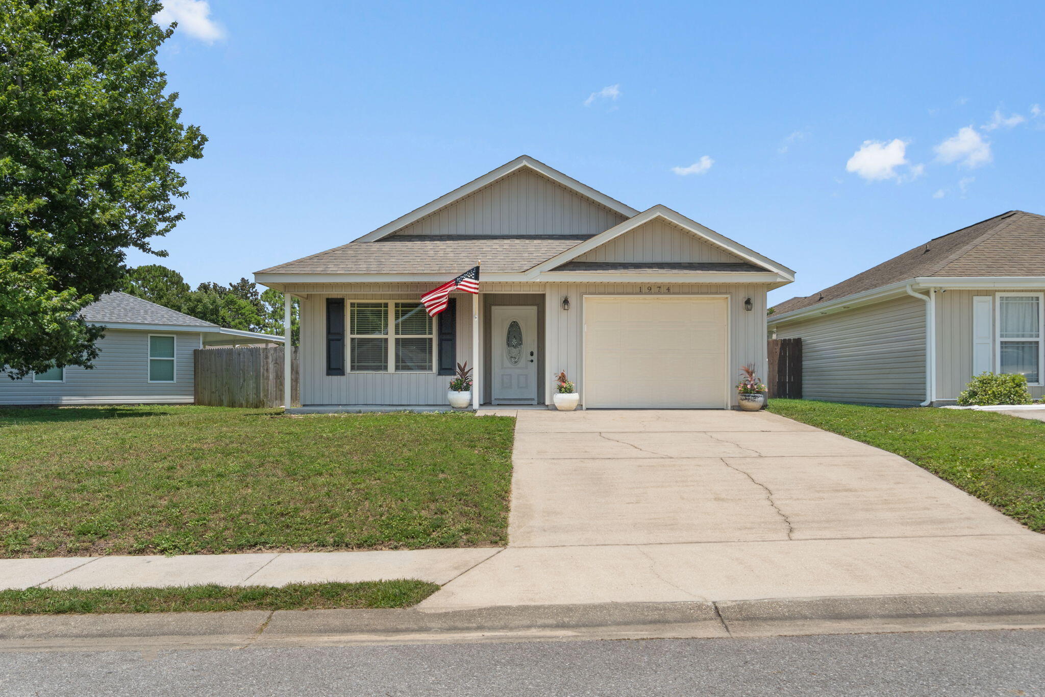 Move-in ready and built in 2014, this charming patio home offers an inviting open concept floor plan, tasteful recent updates, and one of the larger fenced backyards in the neighborhood! Conveniently located with easy access from both Gulf Breeze Parkway and East Bay Boulevard, Shadow Lakes offers underground utilities, sidewalks, and a community park overlooking the lake. Enjoy peace of mind with fresh interior paint, brand-new luxury vinyl plank flooring throughout the living room and kitchen, brand-new carpet in the bedrooms, and durable tile flooring in both bathrooms. The spacious living room is highlighted by a soaring double tray ceiling, creating an open and airy feel. The kitchen features stainless steel appliances, a pantry, a dedicated laundry closet, and direct access to the backyard patio for easy indoor-outdoor living. The private primary suite showcases a tray ceiling, spacious walk-in closet with a pocket door, and an ensuite bath with a double vanity. Two additional bedrooms and a full guest bath are thoughtfully situated in their own wing of the home, offering privacy for family or guests. Built with energy-efficient EarthCents construction, this all-electric home also features Low-E vinyl windows for added efficiency. You'll love this location just minutes from the Gulf Breeze Zoo, the new Soundside High School, shopping, dining, and the beautiful Emerald Coast beaches. Welcome home! (short term rentals allowed)