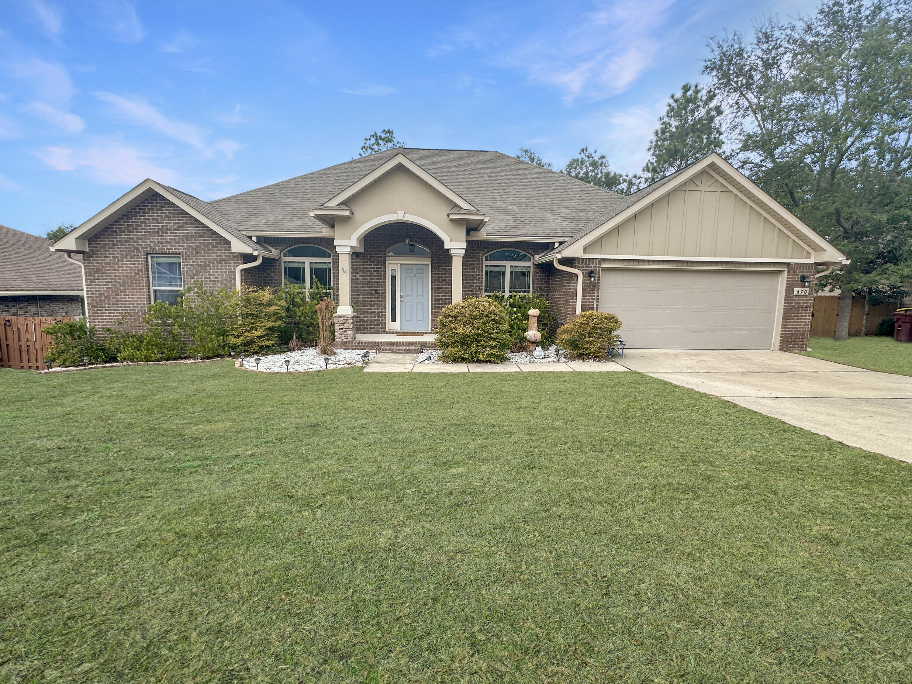 This beautifully maintained home offers a versatile layout with four bedrooms, a flex space, and three full bathrooms. The flex space is ideally positioned near a bathroom and front window, making it suitable for use as an additional bedroom, home office, or guest room.
A spacious 20x20 additional living room provides an ideal space for relaxing or entertaining while overlooking the fully fenced backyard. Recent exterior improvements include a repaired and freshly painted deck, creating an inviting outdoor space to enjoy, as well as refreshed front landscaping that enhances the home's curb appeal. The kitchen is both functional and inviting, featuring custom Sherwood Black Walnut cabinetry, granite countertops, recessed overhead lighting, and under-cabinet lighting that enhances the space.
The owner's suite includes two large walk-in closets and a well-appointed bathroom with double vanities, a tiled shower, and a separate garden tub. Additional features throughout the home include recessed lighting in the formal living area and an electric fireplace.
This home offers comfort, flexibility, and thoughtful updates, ready to be enjoyed by its next owner.
Room dimensions and square footage are approximate. Buyer to verify all measurements.