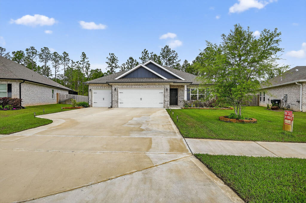 Welcome to Hammock Bay! This picturesque 3 car garage, one-story, 4 bed / 2 bath home on large lot (.35 acres) is ready for it's first renter. This house offers four spacious bedrooms and a large open concept plan featuring quartz countertops, LVP throughout with plush carpet in the bedrooms. The beautiful kitchen featuring stainless steel appliances, featuring a gas range, brilliant backsplash, colorful quartz and custom painted cabinetry will be sure to draw your attention. The large private backyard, backing up to the preserve is the ultimate gathering spot for friends and family. HB South is constructing top of the line amenities including a beautiful sun deck and pool, fitness area, pickleball, playground and a kayak/paddleboard launch.