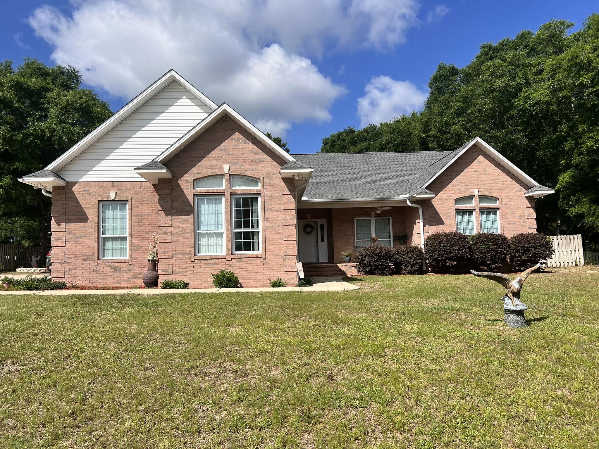 This custom home will meet all of your needs. It is on a large lot with plenty of parking and a storage building, 2 covered carports, fenced in yard, and large relaxing back porch. The interior of the home has a very spacious feel with a open kitchen and dining room. The main bathroom has a separate tub and shower, large walk in closet, private water closet, and dual vanities. There is so much storage space in the laundry room area. The oversized garage has plenty of room for two vehicles with additional room to each side. A small breed pet will be permitted. The home is available now.