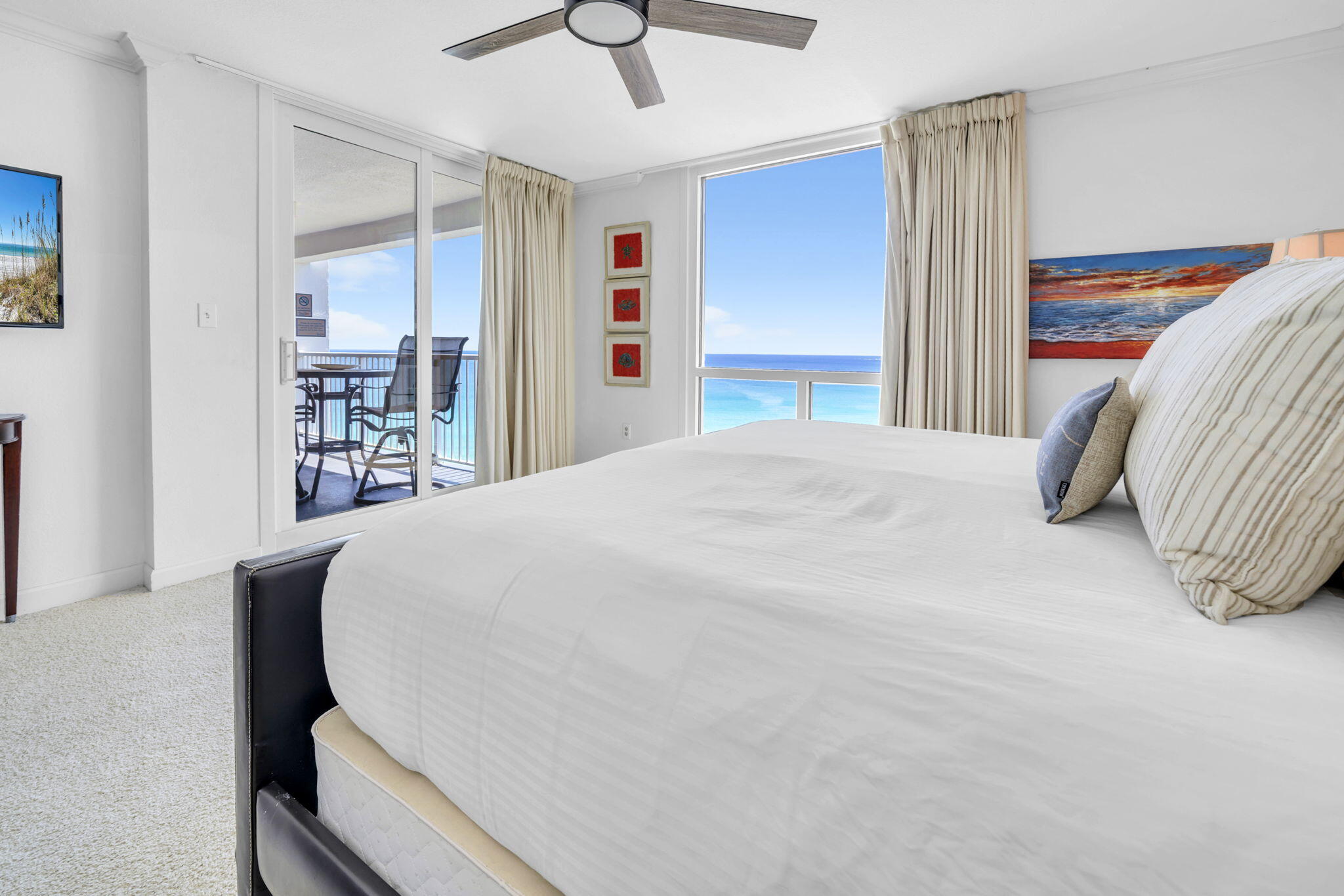Shoreline Towers 1113 pairs 11th-floor Gulf views with one of the community's strongest advantages: approximately 460 feet of private white sand beach in Destin. This remodeled 2 bedroom, 2 bath gulf-front condo offers 1,430 square feet in Tower I and is sold fully furnished and turnkey, with direct beach and Gulf views from the balcony and primary bedroom.
The interior features a bright, open layout with a fully equipped kitchen, dining space, and comfortable living area designed for easy everyday use or short-term guest stays. The current setup includes a king bed in the primary bedroom, two queen beds in the guest bedroom, large flat-screen TVs, and an in-unit washer and dryer. The primary suite includes an en-suite bath with a walk-in shower.
Shoreline Towers has completed a $26M building project that included floor-to-ceiling high-impact glass windows and sliding glass doors. The community has also been recently landscaped and offers 24-hour gated security, a beach walkover, fishing lake, seasonally heated swimming pool, fitness room, private bathrooms with sauna, tennis and pickleball courts, basketball court, shuffleboard, picnic areas, barbecue grills, clubhouse, owners lounge, and parking space for boat trailers and RVs.
The location puts you in the heart of Destin, close to restaurants, shopping, water sports, fishing, golf, Big Kahuna's Water and Adventure Park, and Destin Commons. With no streets to cross to reach the private beach or pool, this condo offers a practical beachside setting for full-time living, a second home, or a rental opportunity. Buyer to verify all dimensions.