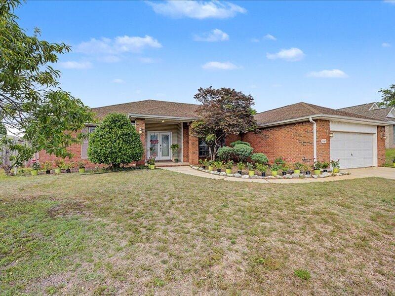 Welcome!  Step through impressive double entry doors into a bright, expansive Great Room in this beautifully maintained 2,762 sq ft home. This inviting residence offers a split bedroom plan with large bedrooms, &  a large fenced backyard--perfect for relaxing or entertaining. Enjoy an active lifestyle with access to pickleball and tennis, or unwind poolside just moments away. The designed split-bedroom floor plan features oversized bedrooms for added comfort and privacy. The spacious primary suite includes his & her vanities, a garden tub and a separate shower. The chef-inspired kitchen is a standout, complete with double gas ovens, a large microwave, and abundant granite counter space--ideal for cooking and gathering. Washer and dryer covey. Located minutes from schools, P. O., Library.