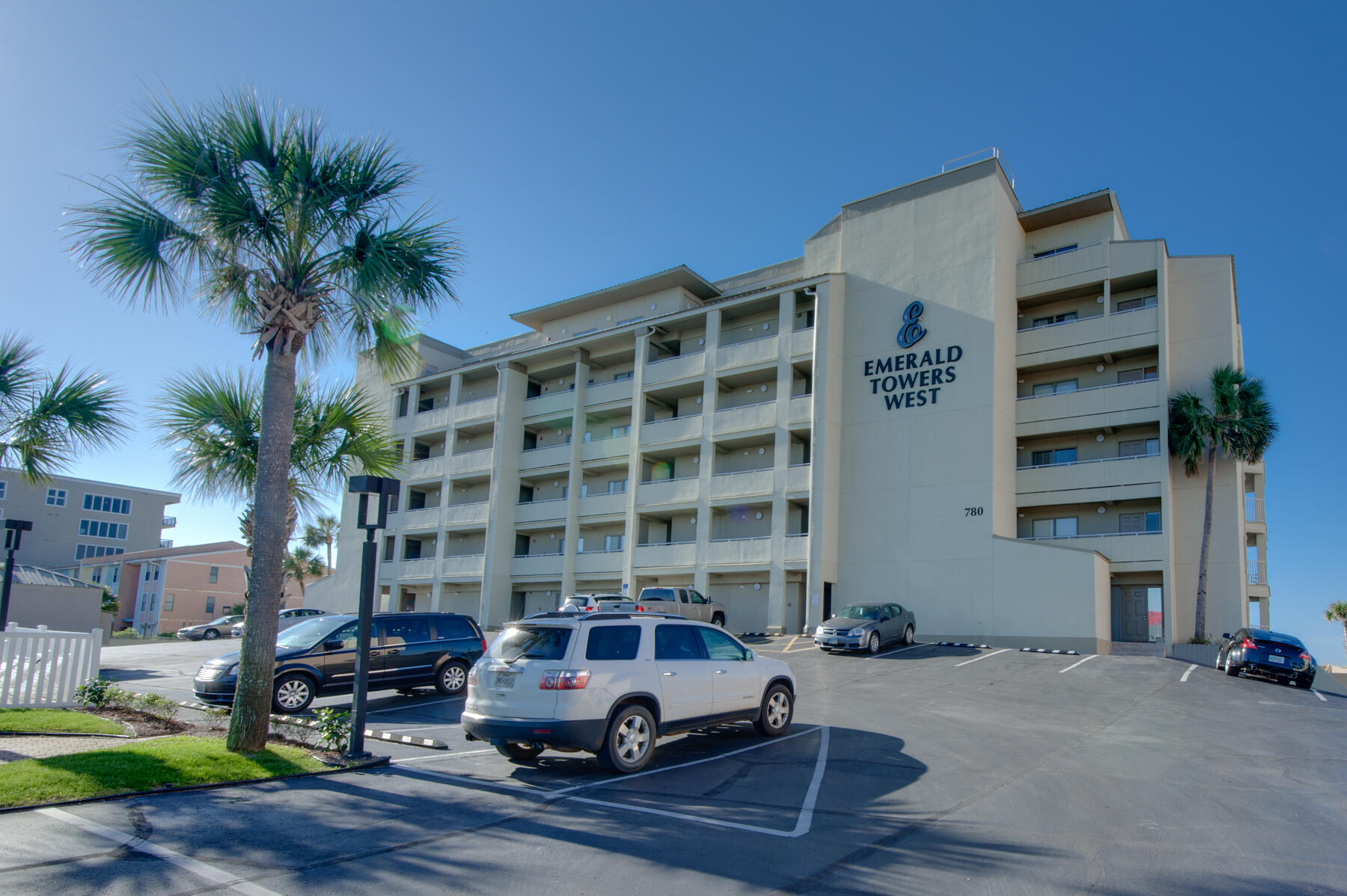 Wake up to the sound of the waves and endless views of emerald-green water and sugar-white sand. This 5th-floor, west-end 2BR/2BA corner condo offers stunning, unobstructed panoramic Gulf views and a wraparound balcony perfect for morning coffee or unforgettable sunsets. Feel the ocean breeze and watch dolphins play right from your living room. Located in a quiet, low-density building with only 44 units, Emerald Towers West features a private pool on the north side--ideal when the south wind is blowing on the beach. Recent major building updates include new roof, elevators, balconies, and sliding glass doors. Great rental potential- unit 2001(mls 978598) grossed over 96K/yr for the previous 3 years. Experience the beauty, serenity, and simplicity of Gulf-front living on Okaloosa Island!