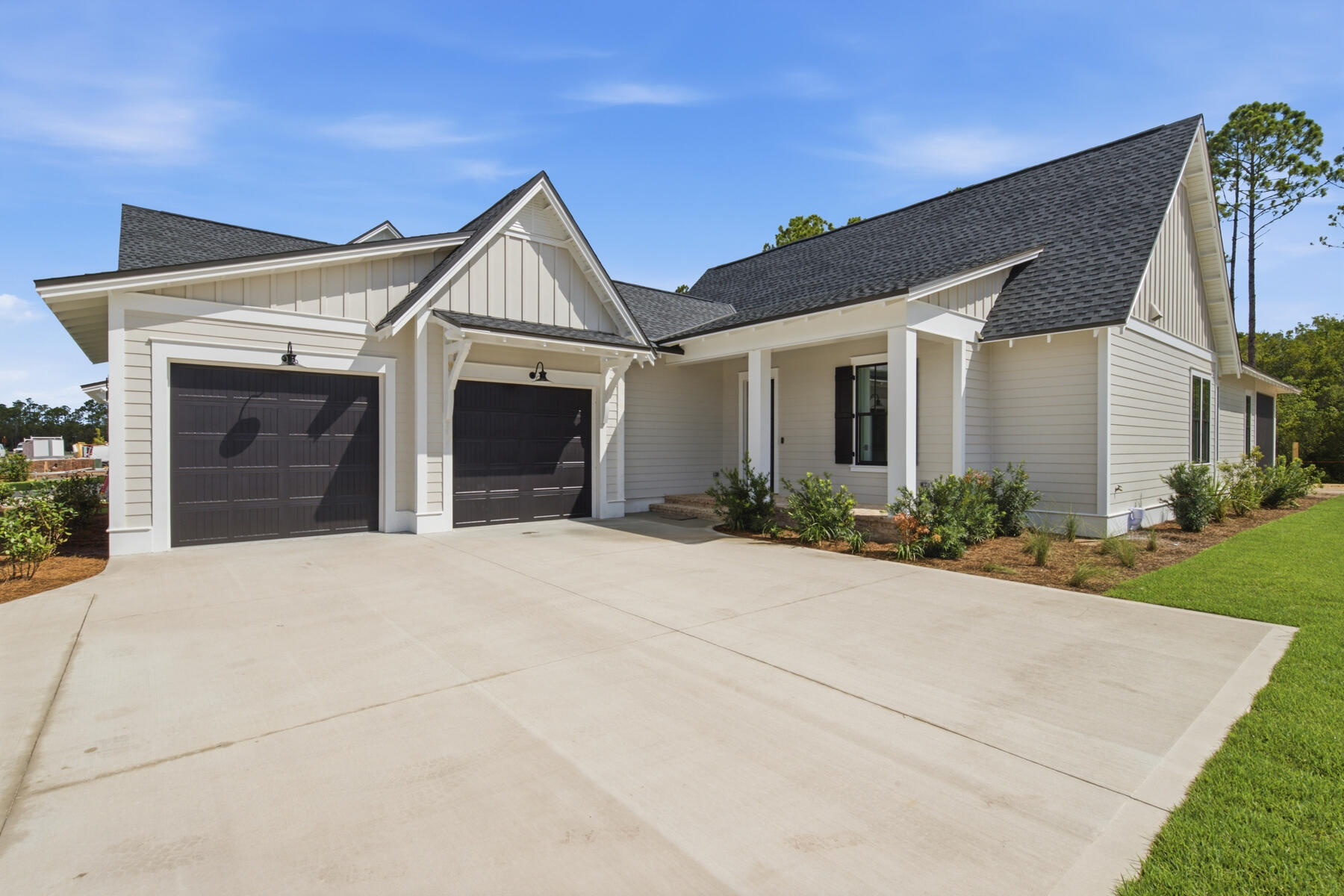 Welcome to the Sydney plan, part of the Preserve Collection in the Arborview Park neighborhood of Watersound Origins. Positioned on a deep homesite exceeding 150 feet with a wooded view, this thoughtfully designed single-level home offers 4 bedrooms, 3 bathrooms, and a 2-car garage and private pool and spa.

The open living, dining, and kitchen areas create a spacious central gathering space, highlighted by 16-foot sliding glass doors in the living room that open to a 12' x 24' screened rear porch with a gas fireplace, seamlessly connecting indoor and outdoor living.

The kitchen is designed for both function and style with quartz countertops, upgraded panel front Wolf appliance package, a expanded island with extra cabinets, and stacked glass upper cabinets that add visual interest and additional storage.

The primary suite is privately positioned and features a well-appointed bath with a freestanding soaking tub, tiled shower, dual vanities, and a large walk-in closet. Each of the guest bedrooms includes generous walk-in closets, offering excellent storage throughout the home. Additional upgrades include pre-wiring and a gas stub for a future generator, plumbing for a water filtration system, shiplap in the foyer, along hallway leading to garage and on kitchen island, solid core doors throughout, extra cabinets and basin sink in the laundry room, upgraded Seaside Limestone tile in bathrooms, dry bar with Scotsman nugget ice machine and panel front SubZero beverage center, epoxy garage floor and EV car charger.

Homes in the Preserve Collection benefit from larger homesites that provide additional privacy and flexibility for outdoor living, including the opportunity to add a pool.

Estimated completion: end-July 2026

As part of Watersound Origins, often called "A Coastal Village," residents relish abundant amenities like the Village Commons resort-style pool, fitness center, sports courts, miles of nature trails, event lawns, and the Origins Golf Course. Surrounded by towering pines and just minutes from Lake Powell and the beaches of Scenic Highway 30A, this community blends natural beauty with easy access to Inlet Beach, Grayton Beach, and beyond. Upcoming highlights include the 15.5-acre Longleaf Art Park, opening in 2027, featuring cultural and recreational experiences.