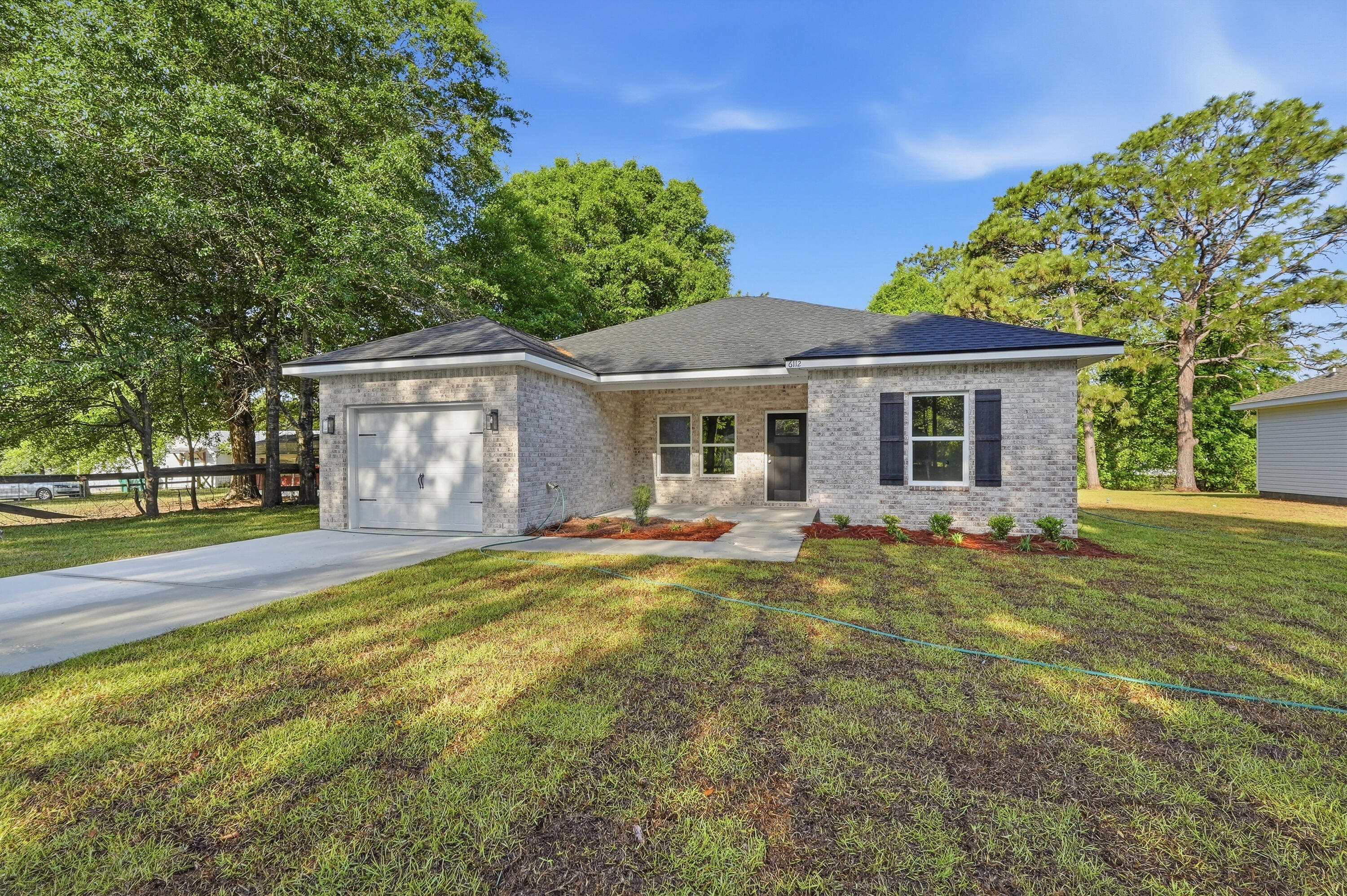 READY NOW - ''Magnolia Floor Plan'' sites on 1/4 fully landscaped yard, cozy front porch and patio in rear for relaxing.  Seller will contribute up to $10,000 towards buyers closing costs/prepaids/rate buydown (call for details).  Interior features include raised ceilings, luxury vinyl plank flooring in common areas, recessed lighting, ceiling fans thru-out quartz countertops, breakfast bar, finished 1-car-garage.  Call to see today!