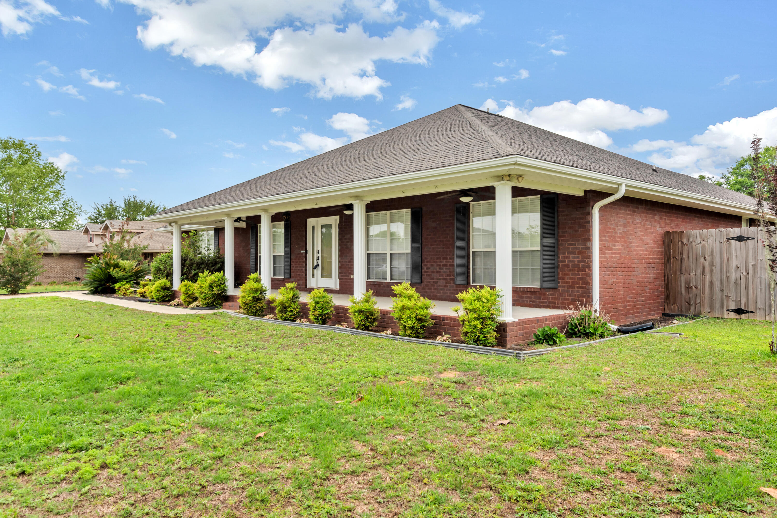 This large home has many upgrades that you would normally see on homes in a higher price range. This 3100+ sq, ft, home features 4 bedrooms plus 3 full bathrooms. If you need, the study could certainly be used as an additional bedroom. A beautiful wood like floor flows through the home including the study, living room, family room and all 4 bedrooms as well as the hallways. The Master has a large bathroom suite with an oversize walkin closet, and double sinks. The kitchen is roomy allowing multiple chefs to prepare food and drinks without tripping over each other. A full slate of appliances including a large fridge as well as an oversize pantry that has plenty of room for food and additional counter appliances. The laundry area is large enough for washer and dryer along with an additional freezer. The home has a gorgeous country feel to it with the covered front porch that continues across the front of the home. The lot is approximately a half acre with irrigation and is accessed through a large gate to the fully fenced back yard. A large shop is at the back and is professionally wired so projects can be done without blocking the side load double garage. This home is a must see for the elegance, price and condition. Check it out soon.