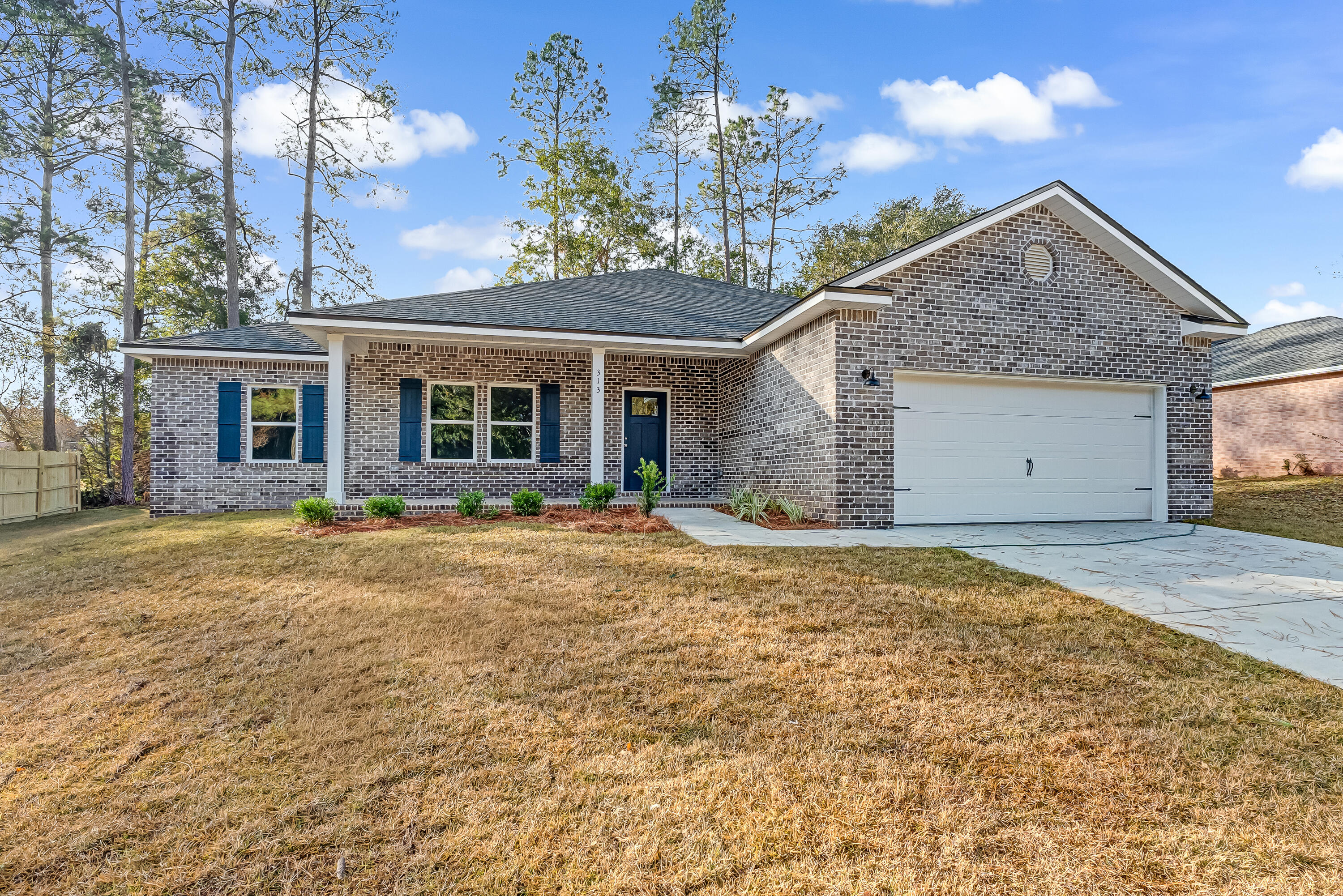 'SIERRA' FLOOR PLAN ON THE SOUTH SIDE! NO HOA/LOW COUNTY TAXES - All brick home w/cul-de-sac location, finished 2-car-garage and fully landscaped yard.  Front & rear porches for relaxing.  Raised ceiling entryway leads to opens to family gathering space overlooking spacious kitchen & cozy dining nook.  Quartz countertops, work island w/bar seating, pantry + white shaker cabinets.  BONUS Mud room and Laundry Room!  Double vanities in both bathrooms and linen storage.  Recessed lighting throughout, ceiling fans in all bedrooms/family room, easy maintenance vinyl plank flooring throughout.  Seller may contribute up to $10,000 towards buyers closing costs (call for details).  EARLY AUGUST COMPLETION.  Photos of similar sold home, elevation will vary, interior/exterior colors & finishes will vary.