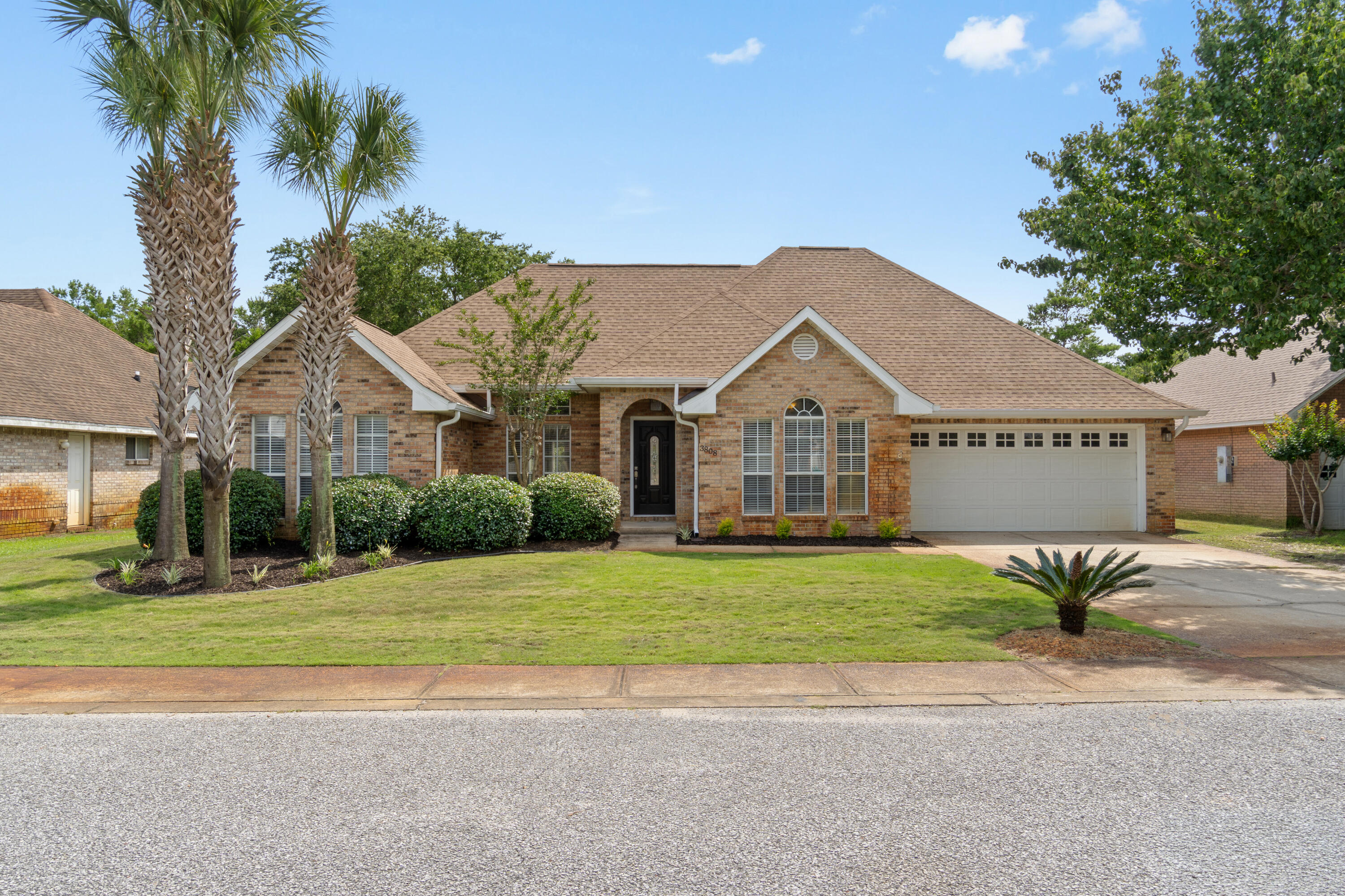 $10,000 SELLER CREDIT WITH ACCEPTED OFFER - ASK AGENT FOR DETAILS | Tucked along Indian Trail, one of Destin's most desirable and established neighborhoods, this solid brick single-story home offers no HOA, a thoughtfully updated interior, and a backyard designed for enjoyment.

Inside, the open living area features built-in bookshelves and flows into a flex space, breakfast nook, and updated kitchen with granite countertops, tiled backsplash, and stainless appliances. The split floor plan offers privacy, with the primary ensuite on one side of the home and two additional bedrooms on the other. All bedrooms feature walk-in closets.

The renovated primary ensuite features double vessel sinks, granite countertops, a separate tiled shower, soaking tub, and large walk-in closet.

Major updates include a new roof (2025), HVAC (2021), attic insulation (2024), water heater (2019), and impact-rated Low-E French doors and windows in the primary suite (2022). New LVP in the living room and new carpet in the guest rooms + flex room were added in 2021, with tile in the foyer, kitchen, laundry room, and bathrooms.

Out back, the recently-refreshed deck and covered gazebo with swing and grilling area are ready to enjoy. Underground utilities and sidewalks throughout. Close to beaches, shopping, dining, and military installations. 

Assumable VA loan at 2.25% offered to an eligible VA buyer with substitution of entitlement. Call for video tour!