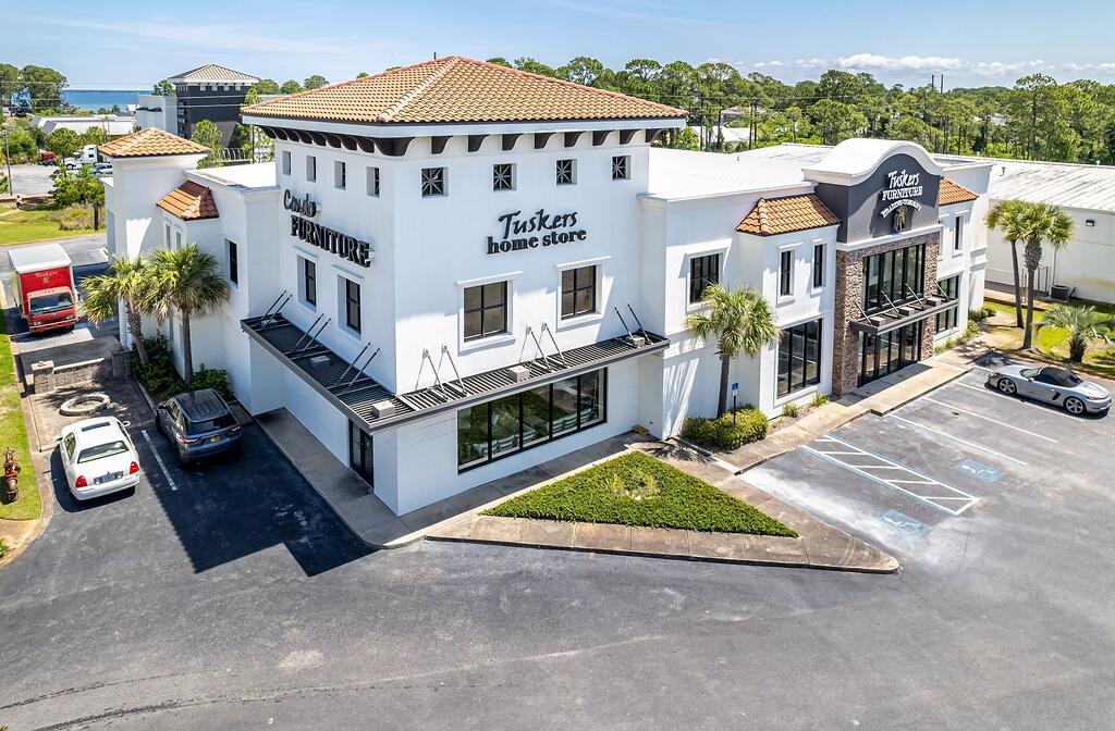 Extraordinary freestanding retail building oriented on a prime corner parcel at a signalized intersection in proximity to the synergistic retail nucleus of Silver Sands Premium Outlets in South Walton County, Florida, and centralized to all the local mixed-use districts, successfully catering to retail patrons from all local peripheral sub-markets, including but not limited to Destin and Scenic 30A of Santa Rosa Beach, Florida.  Fronting Highway 98 in Miramar Beach, Florida, ±50,000 vehicles pass by its 196 fronting feet daily, which convenient ingress and egress lures the traffic into the retail facility through the traffic light at North Geronimo Street and Highway 98 in Miramar Beach, Florida.  The current owner has committed significant capital by renovating the building, which even includes escalators to service the second floor of the main showroom.  The parcel contains a two-story building, oriented on approximately 1.18 acres, hosting prime retail and showroom space, as well as private offices, collectively measuring approximately 26,893 conditioned square feet. There is a 3rd floor that accommodates a spectacular executive office, accessible via a private "floating" staircase. The structural integrity of the building is phenomenal, and the finishes throughout are exceptional. This opportunity is irreplaceable, as Walton County land development code would neither accommodate this expansive yield, nor would a developer endeavor upon such a project, as the development and building costs indicative of this era, coupled with land costs, (even if such prime vacant commercial land at a traffic light were available, which is nearly non-existent), would likely exceed $15m+. The current business is winding down its operation, and thus, occupancy should be plausible by ±March, 2026.  All showings are by appointment only and require advanced notice. The listing broker(s) must accompany all showings.