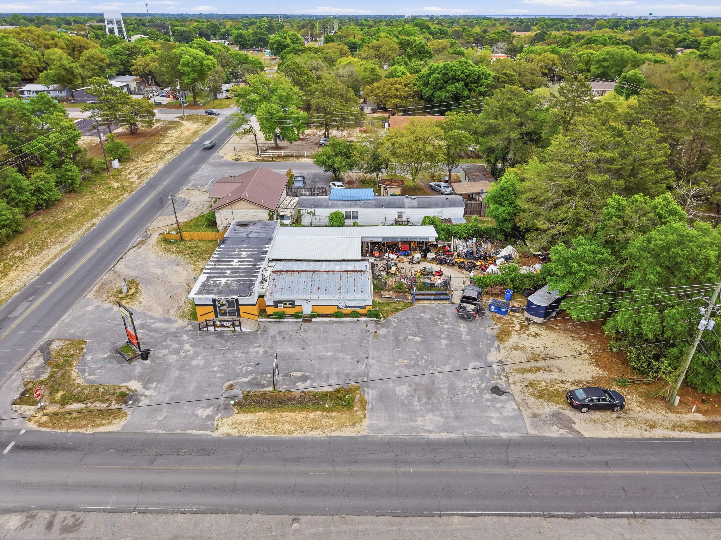 Rare opportunity to purchase a long-standing Fort Walton Beach commercial property with the option to acquire an established outdoor power equipment business, inventory, and operating platform. Located at 799 Navy Street, Stiles Outdoor Power Equipment has served the local market for more than 60 years and is a second-generation, family-owned business specializing in outdoor power equipment sales, repairs, parts, and service. The business offers equipment sales and service for lawnmowers, chainsaws, generators, trimmers, and related outdoor power equipment, with recognized product lines including STIHL, Walker, Wright, Hustler, Honda, and others.

The property consists of approximately 0.32 acres with two buildings totaling approximately 4,011 square feet. The main building is approximately 3,102 square feet, with an additional approximately 909-square-foot secondary building, providing a flexible layout for retail, parts, service, storage, equipment display, repair operations, or continued use as an outdoor power equipment sales and service location.

Offered as either real estate only for $599,000 or as a package including land, buildings, business, and inventory for $799,000. This is an ideal opportunity for an owner-operator, existing equipment dealer, repair/service business, investor, or entrepreneur looking to acquire a known local location with decades of market presence and built-in business goodwill.