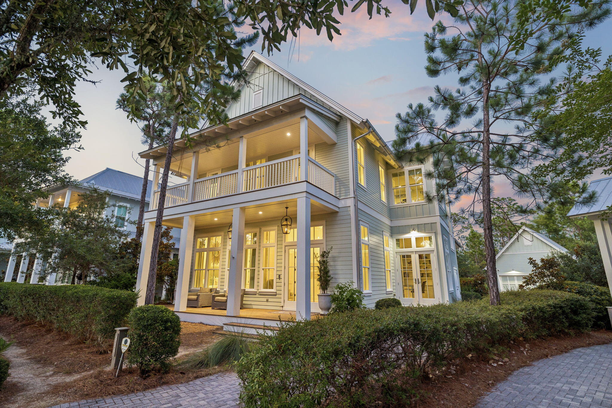 This six bedroom custom-built coastal compound does more than welcome you home -- it creates a legacy.
This home was custom designed by Romair Development Group and its one-of-a-kind finishes throughout make it one of the standouts in all of Watercolor!
An indoor fireplace centers the great room with warmth and style, while the open-concept design leads to a dream kitchen with Sub-Zero appliances and an inviting dining area made for weekend gatherings.
Three luxury primary suites offer guests resort-style comfort and privacy, while a seperate  bunk room gives children a fun and inviting space of their own.
An enclosed office with cascading natural light  creates a private retreat for work, study, or quiet focus.   The home blends sophisticated technology with effortless comfort, featuring a Control4 smart home system and automated lighting throughout. 
Just beyond the doors, the outdoor living takes center stage!  A shimmering, heated pool invites long afternoons in the sun, while a private cabana, fireplace, and television set the scene for relaxed evenings year-round.   The outdoor living goes beyond again with an extraordinary kitchen that sets the stage for year-round entertaining, while spacious porches surround the home with large-screen TVs, swing beds, and beautifully designed areas for relaxing and gathering.
Behind the home, a protected nature preserve wraps the property in peaceful quietude and delivers a rare sense of privacy. Offered fully furnished, this extraordinary residence delivers a rare opportunity to own in WaterColor, one of 30A's most desirable communities. Don't miss the chance to make it yours.