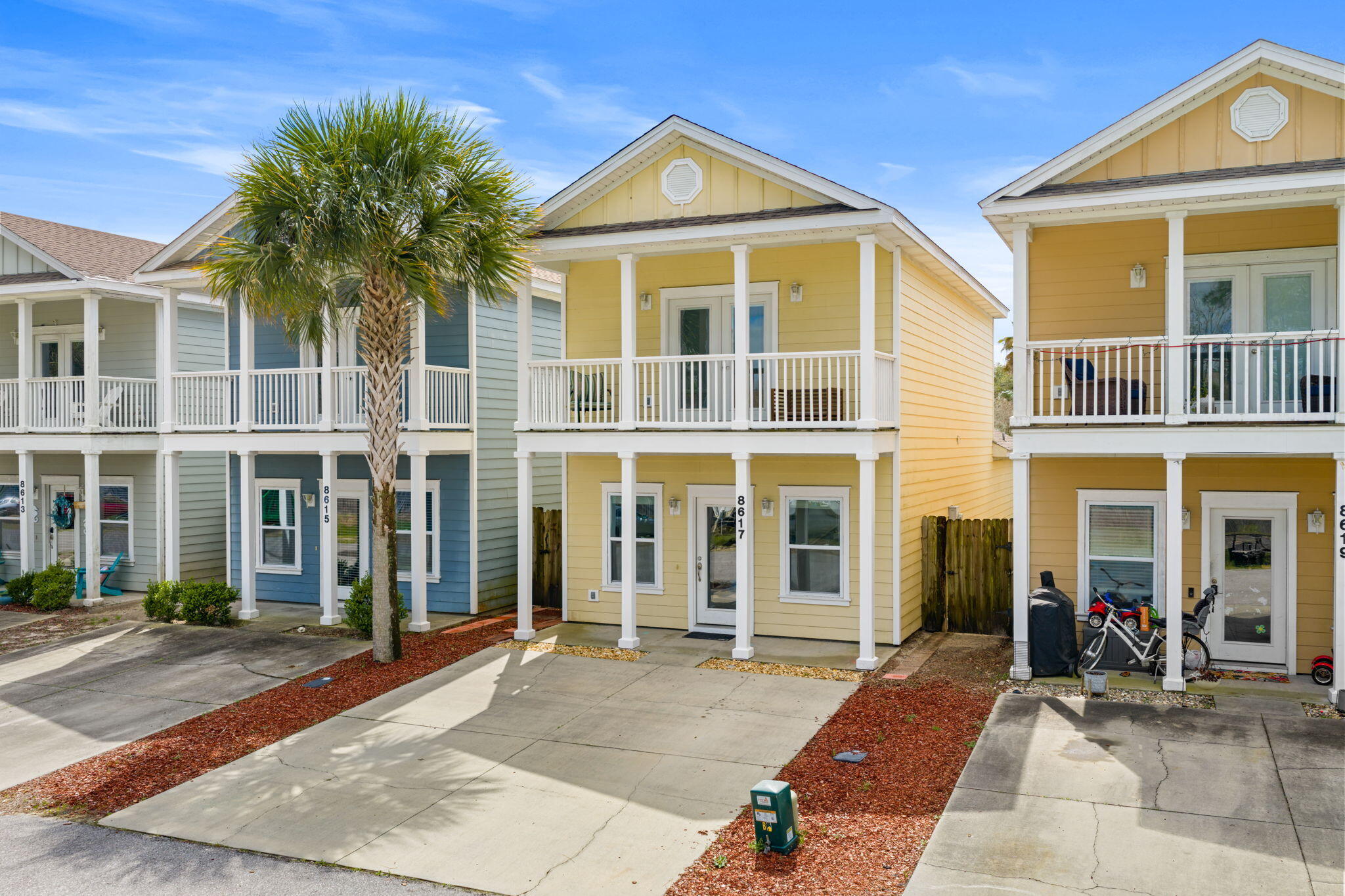 Priced to sell, 8617 Marlin Place offers an incredible opportunity to own in a gated community in Panama City Beach. Built in 2015 and recently refreshed with new interior paint, this 3-bedroom, 2.5-bath home features nearly 1,600 square feet of well-designed living space. The primary bedroom is located on the first floor with a walk-in closet and private bath with tiled shower. The open living area offers 9-foot ceilings, and the kitchen includes granite countertops, white shaker cabinetry, and stainless appliances. Upstairs features two additional bedrooms, including one with a private balcony. Community pool and low-maintenance living with HOA covering lawn care, trash, and gated access. Convenient to the Navy base, St. Andrews State Park, and the beach.
