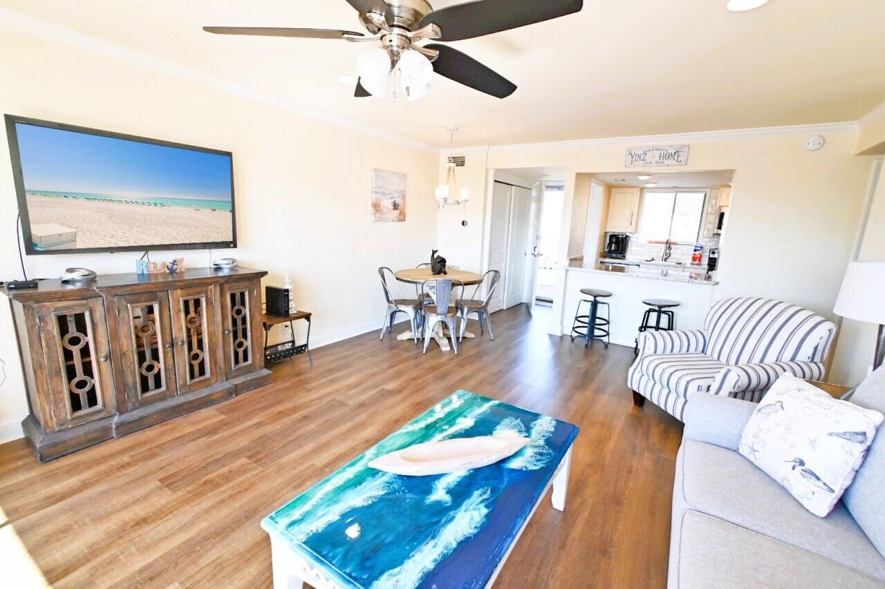 Welcome to this beautifully updated 1-bedroom & rare 1.5-bath condo; an uncommon & highly desirable floor plan in Sandpiper Cove. Offering 708 square feet of thoughtfully designed space, this unit features a spacious bedroom with a dressing area & private half bath, adding comfort & functionality for both owners & guests.

This turnkey property features an updated coastal interior & an open living space that flows to relaxing canal & water views. Located just steps from private beach access, as well as canal access & boat docking (available for a fee), it offers the perfect balance of convenience & tranquility for both personal use & rental appeal.

Ideal for a vacation rental, investment or beach retreat; Unit 2047 offers location, updates, amenities & strong rental potential in Destin. Sandpiper Cove spans 43 acres and offers one of Destin's most amenity-rich resort environments with over 1,100 feet of private beachfront, five swimming pools (two heated), three hot tubs, tennis and pickleball courts, a 9-hole par-3 golf course, marina access, shuffleboard courts and on-site dining including the award-winning Louisiana Lagniappe restaurant and the popular beachfront Sand Flea Beach Bar. Owners and guests also enjoy seasonal beach service and convenient access to the Destin Harbor, HarborWalk Village, grocery, shopping, dining, gyms, water taxi and entertainment.

**Please note that all dimensions and information provided are subject to verification by the buyer.