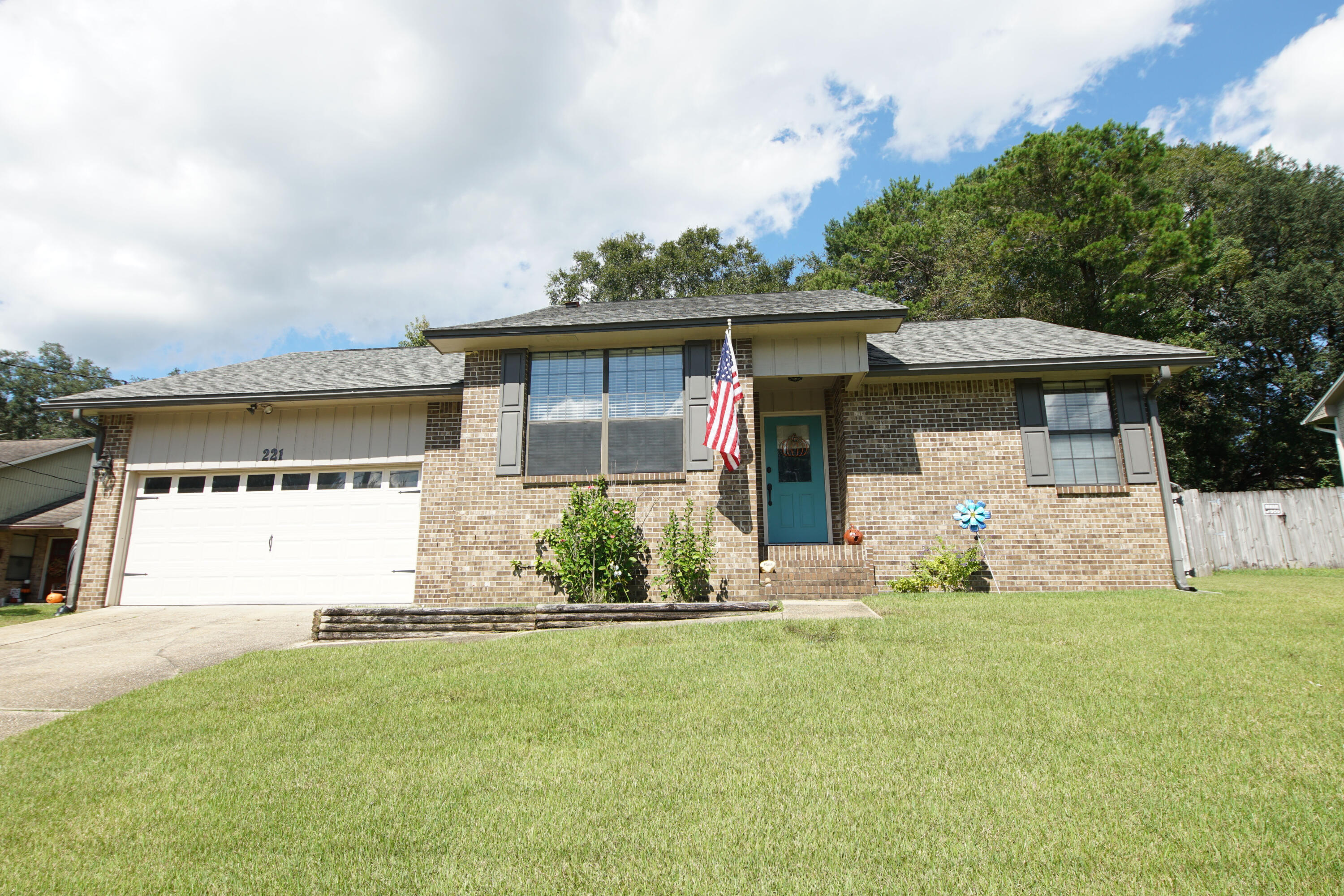 KICK OUT CLAUSE IN PLACE. Nicely maintained all-brick home in the heart of Niceville! This 3-bedroom, 2-bath home features a desirable split floor plan and sits on a spacious lot with an attached 2-car garage.
The kitchen overlooks the front yard and offers ample cabinetry along with space for a breakfast table. The living room is warm and inviting with a fireplace, built-in shelving, and views of the backyard--perfect for relaxing or entertaining.
The large primary suite includes an updated en-suite bathroom featuring a tiled walk-in shower and double vanity, along with a generous closet. Two additional bedrooms are located on the opposite side of the home and share a hallway bathroom.
Laminate flooring runs throughout the main living areas and bedrooms--no carpet-- while the kitchen and bathrooms feature tile flooring.
Step outside to a fully fenced backyard complete with a patio, deck area, and a storage building--ideal for outdoor enjoyment and extra storage.( Yard shed conveys in AS IS condition). 
Photos of the home are from BEFORE this tenant moved in)

Roof replaced in 2022. Water heater 2020. AC 2015