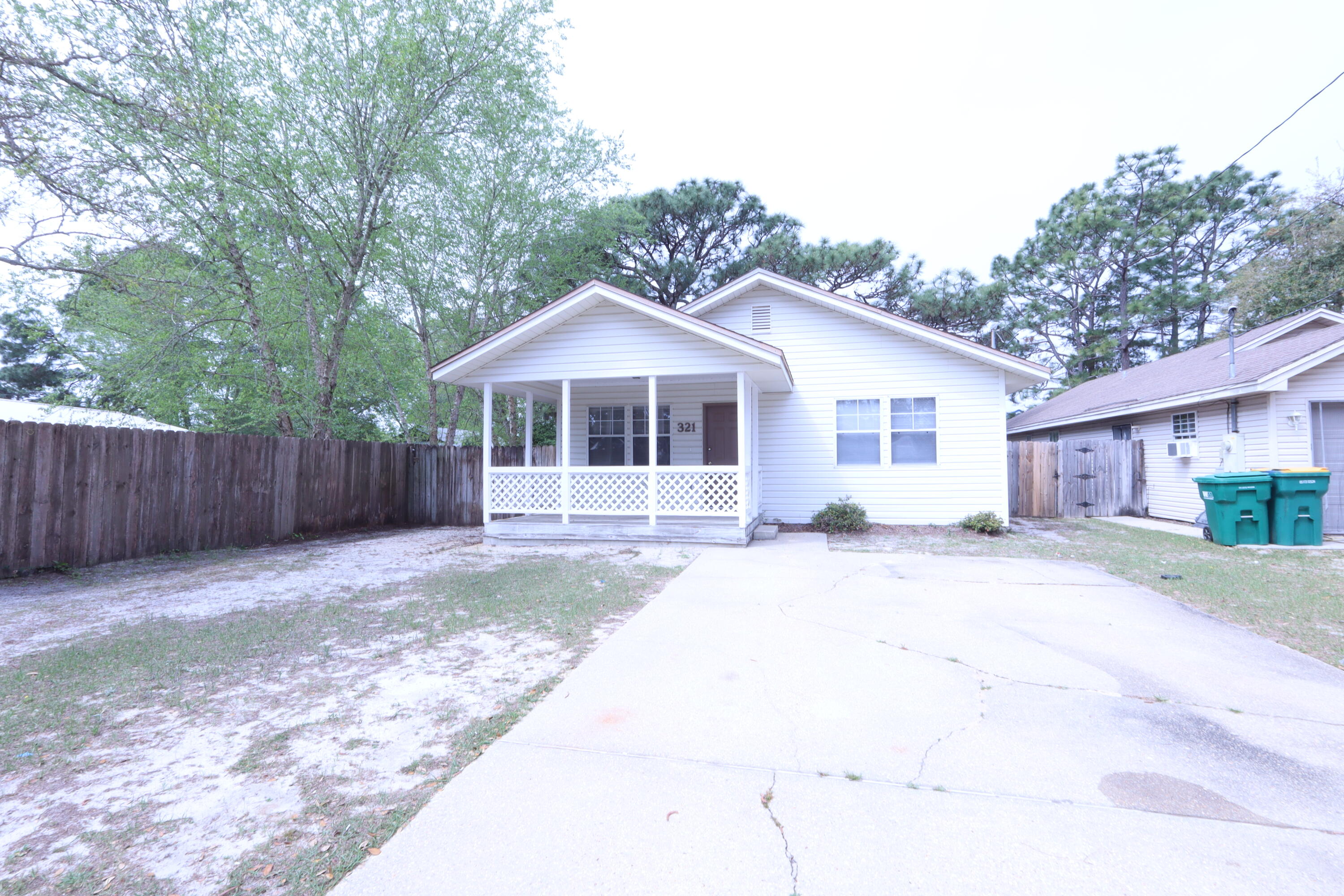 Charming Florida-style cottage located west of Hurlburt Field in desirable Wynn Haven Beach! This inviting 2-bedroom, 1-bath home offers comfortable living space and is full of character. Enjoy relaxing on the covered front porch or step inside to a bright and welcoming interior designed for both comfort and functionality. The home features a spacious living area, well-sized bedrooms, and a full bathroom for everyday convenience. An inside laundry room with washer/dryer hookups adds to the practicality of the home. The large fenced backyard provides ample room for outdoor enjoyment. Located in the heart of Mary Esther, this home is just minutes from Hurlburt Field, making it an ideal choice for convenience and lifestyle. Sorry no pets. All Coastal Realty Services residents are enrolled in the Resident Benefits Package (RBP) which includes renters insurance, HVAC air filter delivery (for applicable properties) and our best-in-class resident rewards program, and much more!