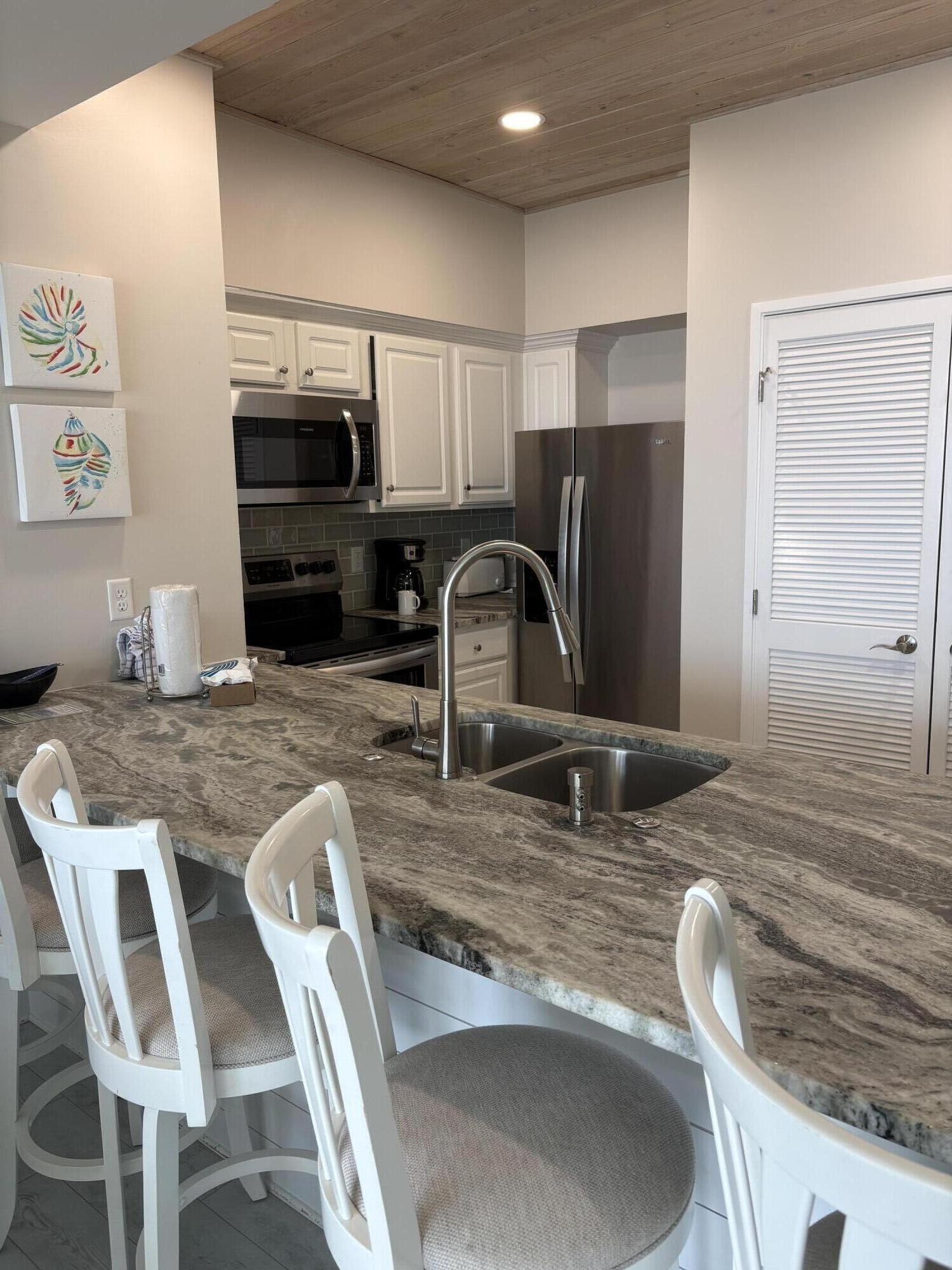 Professional photos coming soon. Welcome to this beautifully renovated, southwest-facing condo where coastal charm meets modern comfort. Thoughtfully updated throughout, this handicap-friendly residence features a brand-new HVAC system, durable luxury vinyl plank flooring, and stunning leathered granite countertops.

The well-appointed kitchen showcases stainless steel appliances, a distinctive pickled white Pecky Cypress plank ceiling, and a stylish shiplap-accented breakfast bar--perfect for casual dining and entertaining. Coastal-inspired furnishings create a warm, inviting atmosphere that complements the breathtaking Gulf surroundings.

Step outside to the expansive 20' x 39' covered balcony, an exceptional outdoor living space ideal for enjoying Gulf breezes, spectacular sunsets, and panoramic views.

As an owner or guest at Tides, you'll enjoy access to an impressive array of resort-style amenities, including a Gulf-front swimming pool, tennis and pickleball courts, shuffleboard, grilling area and over 600 feet of private sugar-white beach frontage within the renowned TOPS'L community.

Whether you're seeking a personal beachfront escape or an outstanding investment opportunity, this exceptional condo delivers the very best of Gulf Coast living.