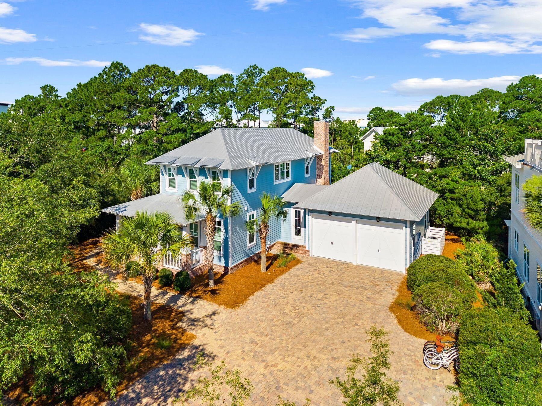 Nestled within the sought-after and quiet community of Lakeview, this exceptional custom residence, built by Turner Custom Homes and thoughtfully designed by Archiscapes, offers the ideal blend of craftsmanship, privacy, and coastal living. Situated along the peaceful shores of Tresca Lake, the property enjoys no neighbors directly behind and generous separation from surrounding homes, creating a rare sense of seclusion just moments from the beach.
Designed with both everyday living and entertaining in mind, the spacious open-concept floor plan features a large living area that flows seamlessly from the oversized kitchen, creating a welcoming space for gathering with family and friends. A first-floor bedroom provides flexibility for guests or multigenerational living, while the primary suite offers added convenience with a secondary laundry area located within the expansive walk-in closet.
Outdoor living takes center stage with a large private pool, screened-in porch ideal for year-round dining and relaxation, and a private setting that embraces the natural beauty of the lakefront surroundings. The oversized garage is a rare find, offering enough space to accommodate a bay boat while still providing room for vehicles, storage, and recreational equipment. An expansive driveway further enhances the property's functionality, providing ample parking for family and guests alike. With no HOA, beach access within walking distance, and a floor plan equally suited for a primary residence, vacation retreat, or investment property, 376 Lakewood Drive presents a rare opportunity to own a thoughtfully crafted home in one of the area's most desirable coastal neighborhoods. From its quality construction and timeless design to its unmatched privacy and location, this is coastal beach living at its finest.